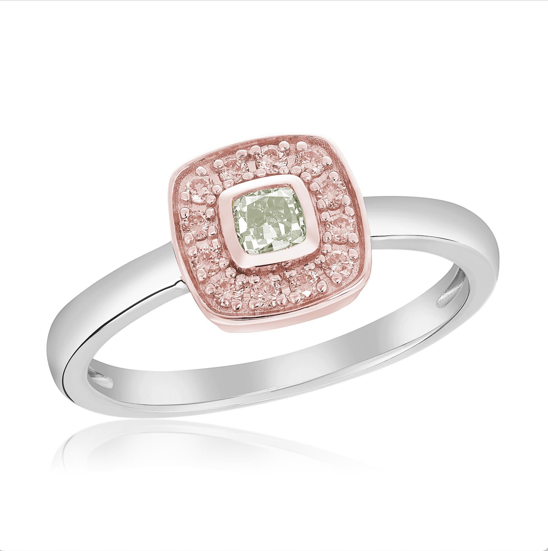 Indulge in the exquisite beauty of our stackable halo ring, adorned with a captivating 0.16-carat fancy intense yellowish-green cushion diamond. Embraced by a halo of 14k rose gold, this enchanting gem is enhanced by 12 dazzling fancy argyle pink