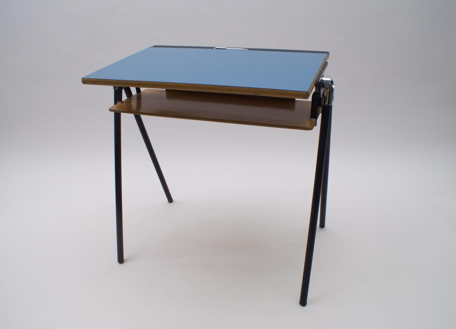 School desk and chair (Palini),
1960

The Castiglionis with Caccia Dominioni presented several prototypes manufactured by Palini including T12 ( with the same pen tray as this one), which was awarded the Compasso d’Oro, 1960. These are stackable