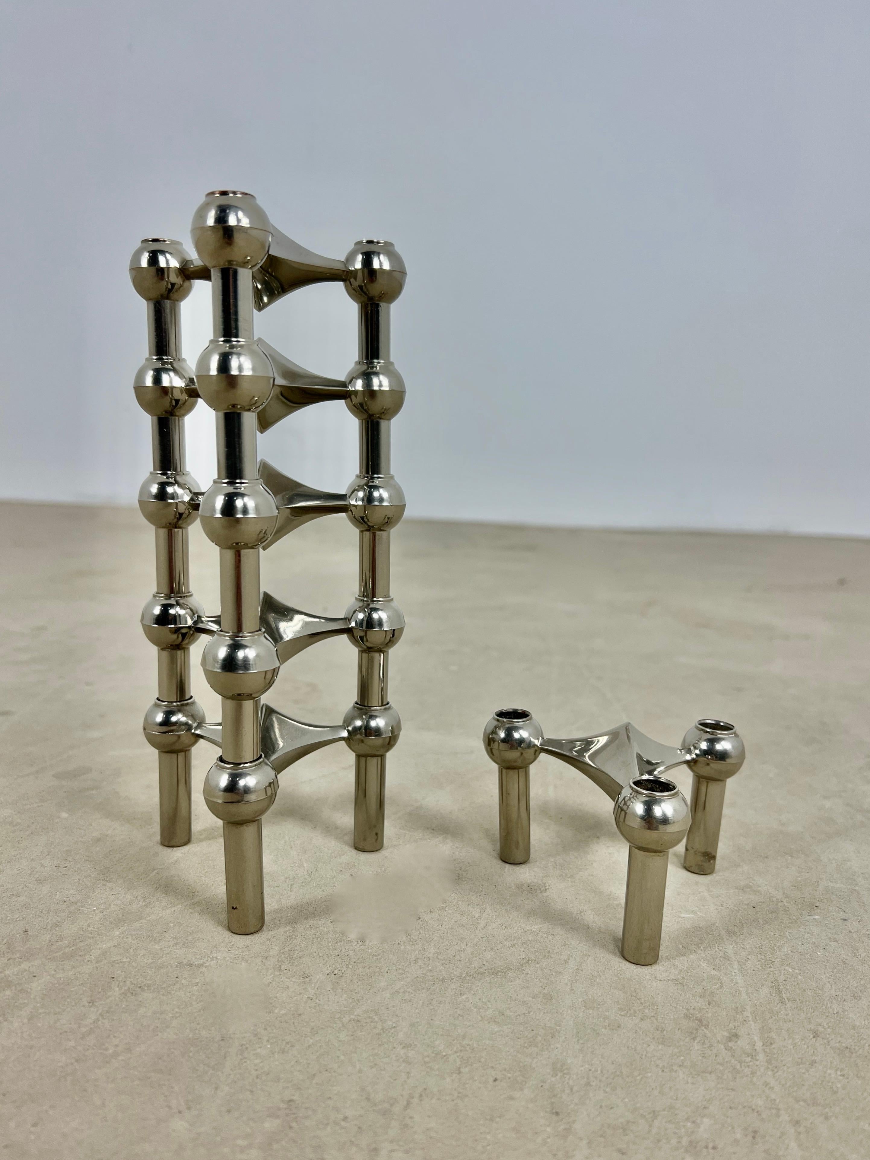 Set of 6 candlesticks in chromed metal. Wear due to time and age of candle holders.