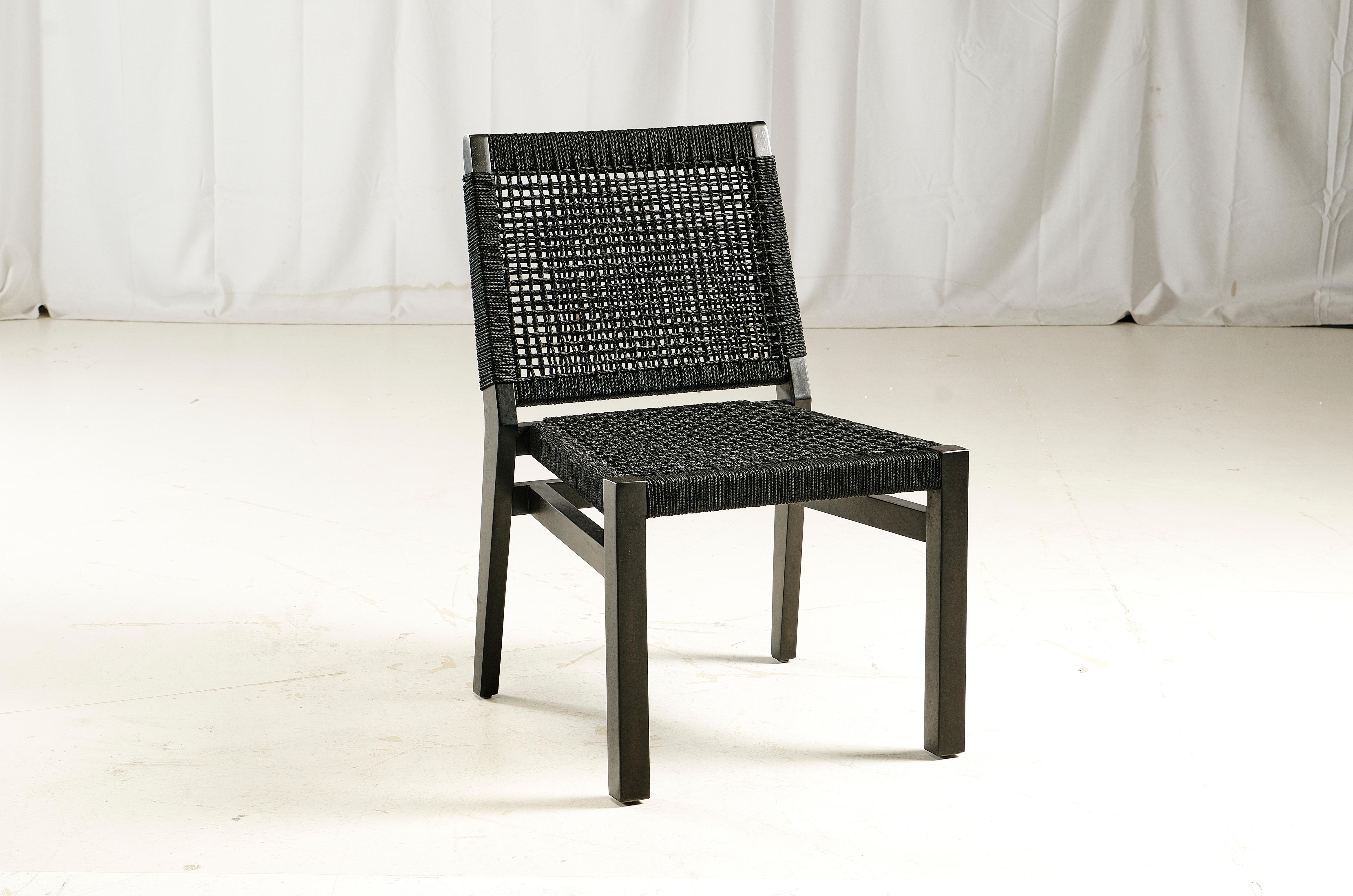 Acacia wood frame, charcoal wash. 
Synthetic rope off white color.
Rope thickness: 4.5 mm
Contract grade chair.
Avoid chemicals when cleaning stained wood.
Contact us to enquire about COM/COL production, requirements and material shipping