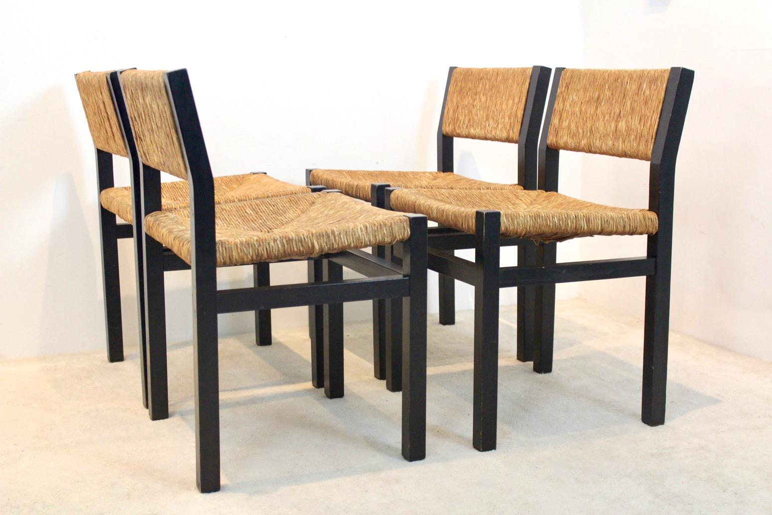 Characteristic chair designed by Martin Visser in the ‘60s for Spectrum Holland. The frames of the chairs are made of black Ash and upholstered with Papercord. We have 4 in Black ash and 6 in oak Wenge color. Total of 10 chairs. The chairs are used