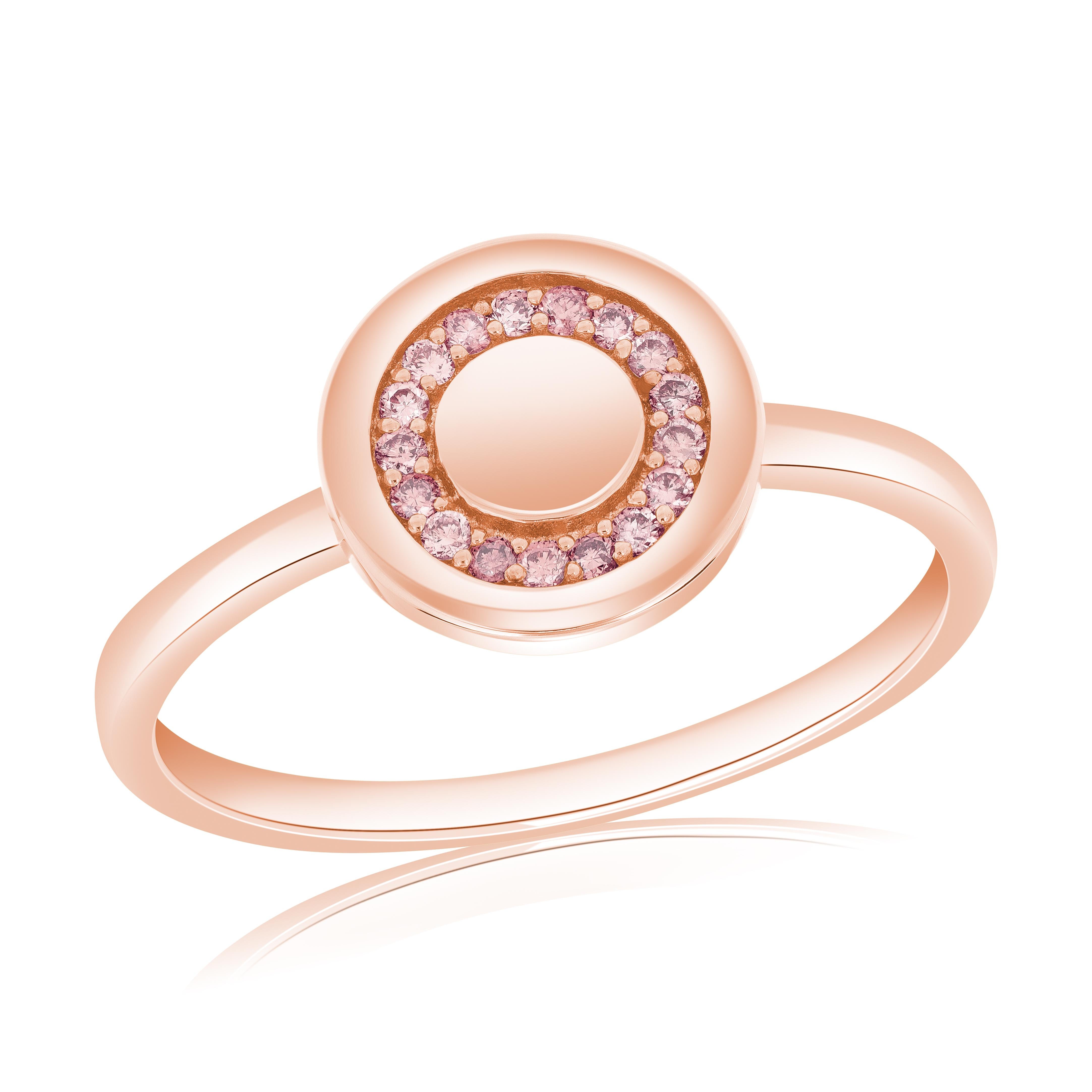 The 18M00742-RG ring is a stunning piece that showcases a blush pink circle disk design adorned with 18 natural pink diamonds, weighing a total of 0.09 carats. The delicate pink diamonds add a touch of beauty and sophistication to the ring, creating