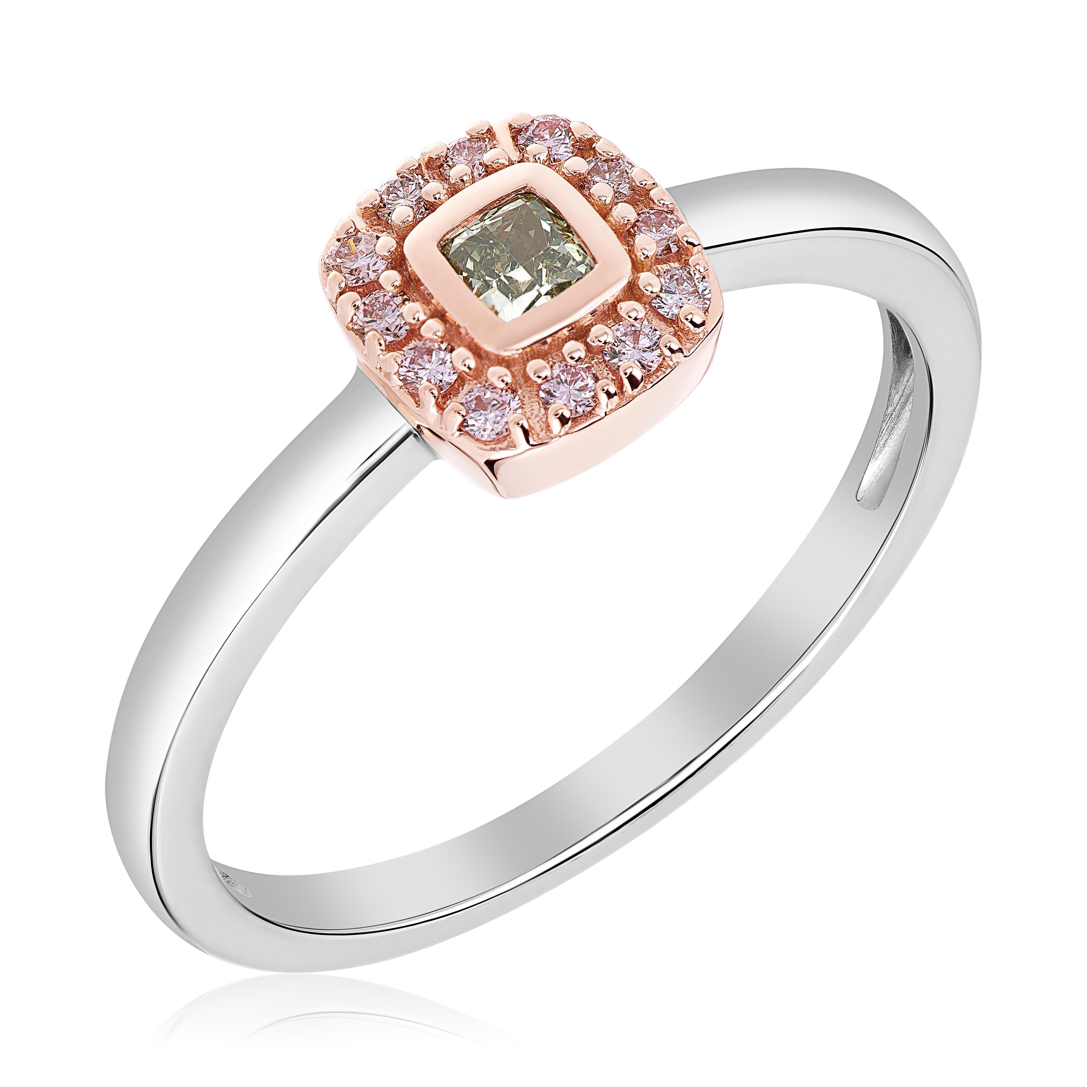 Stackable halo ring feating a 0.12 fancy intense yellowish-green cushion. Accented by 14 argyle pink diamonds weighing 0.13 carats. Set in 14k rose and white gold, ring size 7. This ring can be accessorized by any of our stackable rings or perhaps