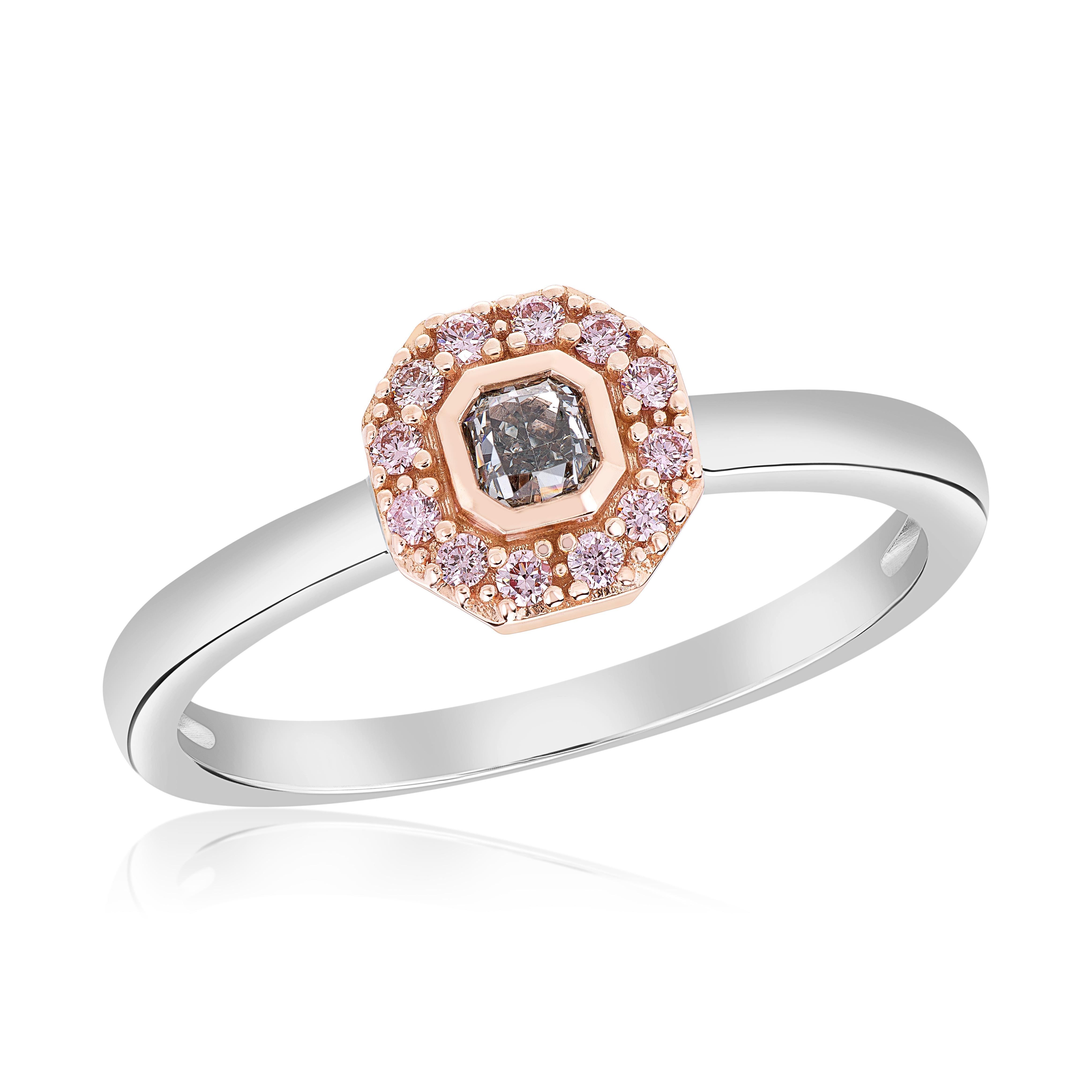 Stackable halo ring feating a 0.19 fancy intense green radiant. Accented by 14 argyle pink diamonds weighing 0.13 carats. Set in 14k rose and white gold, ring size 7. This ring can be accessorized by any of our stackable rings or perhaps one that is