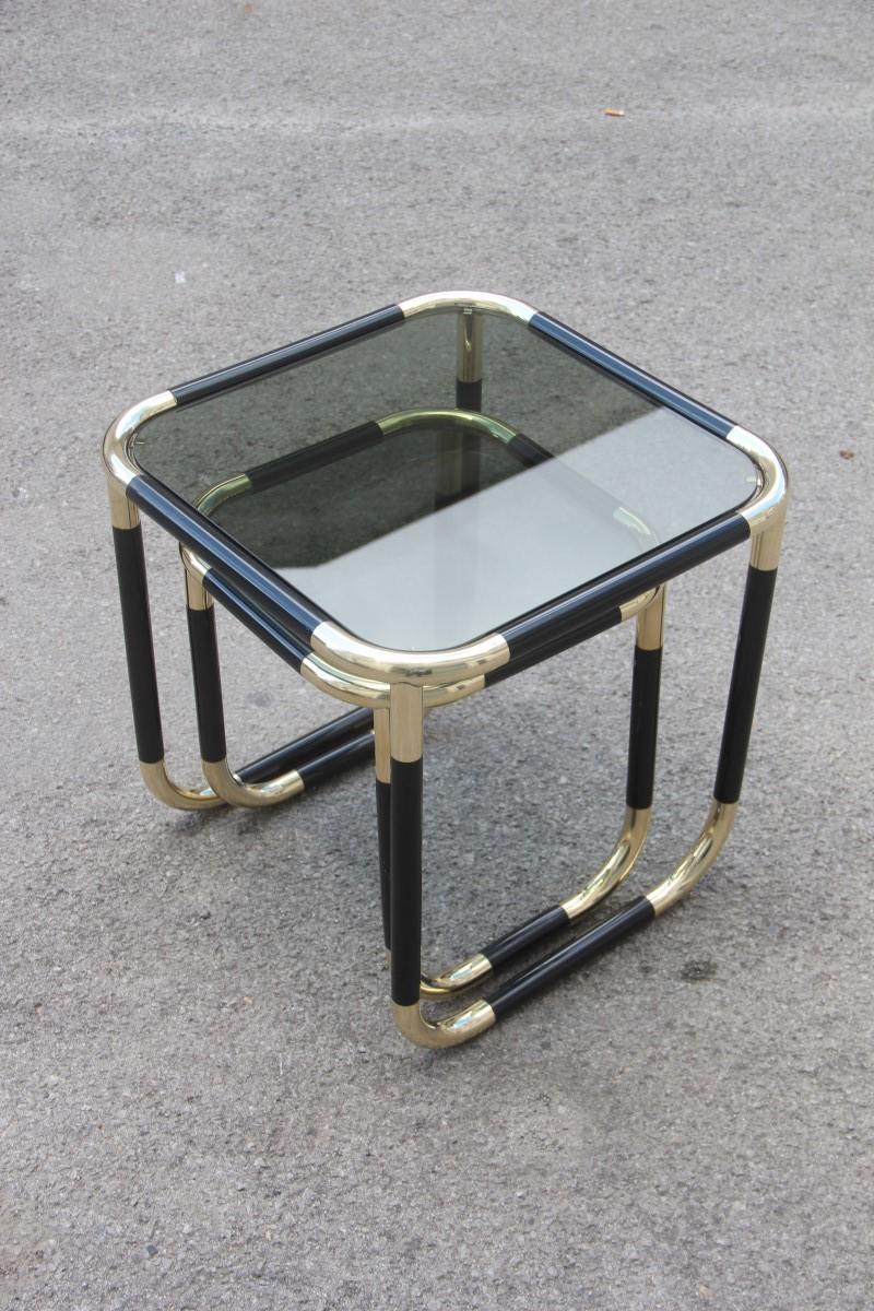 Stackable tables in black resin and gold brass design 1970 Italian Willy Rizzo Attributed.
Glass grey top.

Large height cm 46, width cm 46, depth cm 46.
Small height cm 38, width cm 35, depth cm 35.