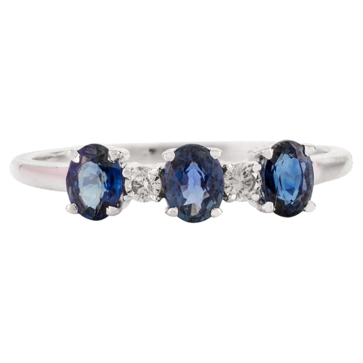 For Sale:  Stackable Three Stone Blue Sapphire and Diamond Minimal Ring in 14k White Gold