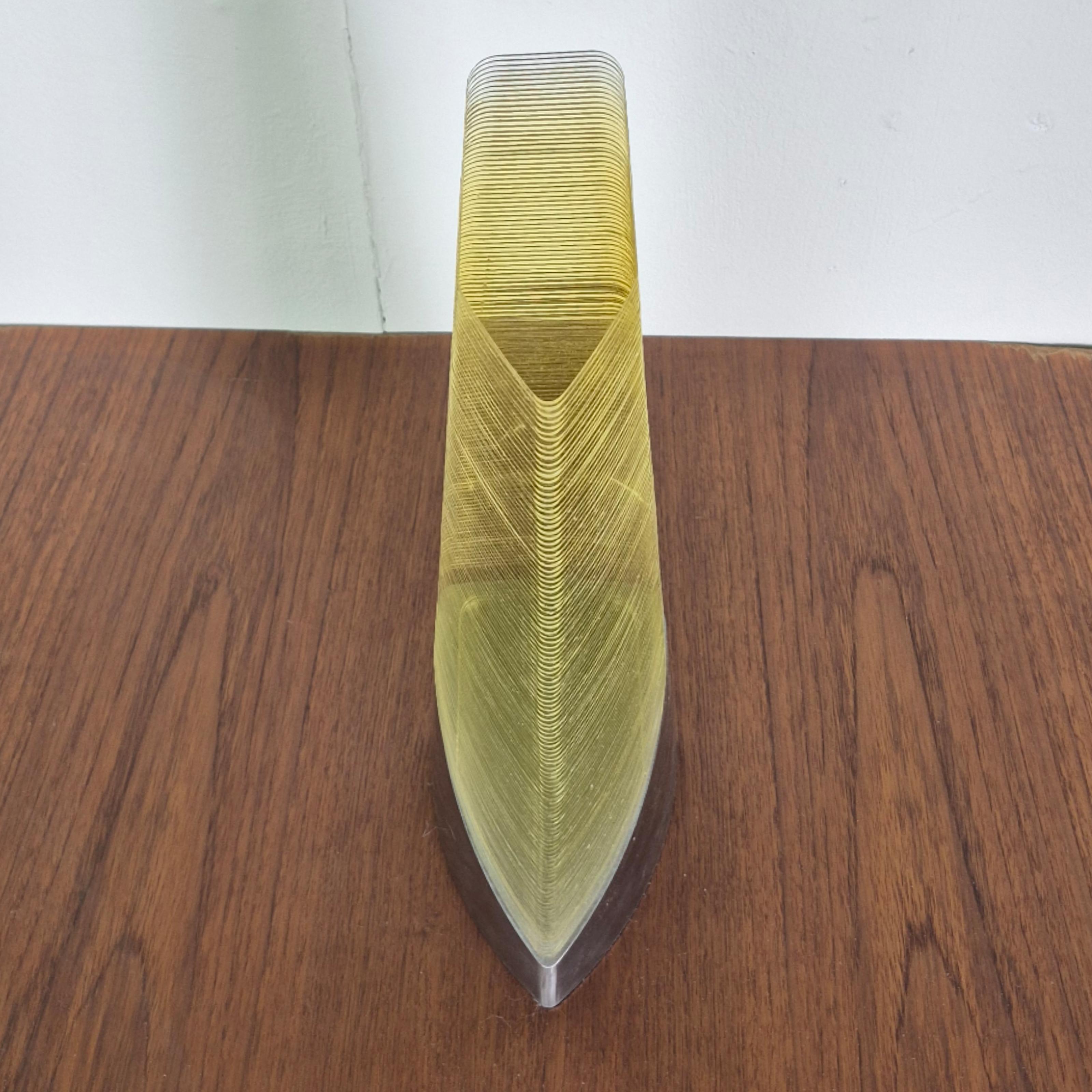 Hand-Crafted Stacked amber glass sculpture on a metal base, Netherland 1980s For Sale
