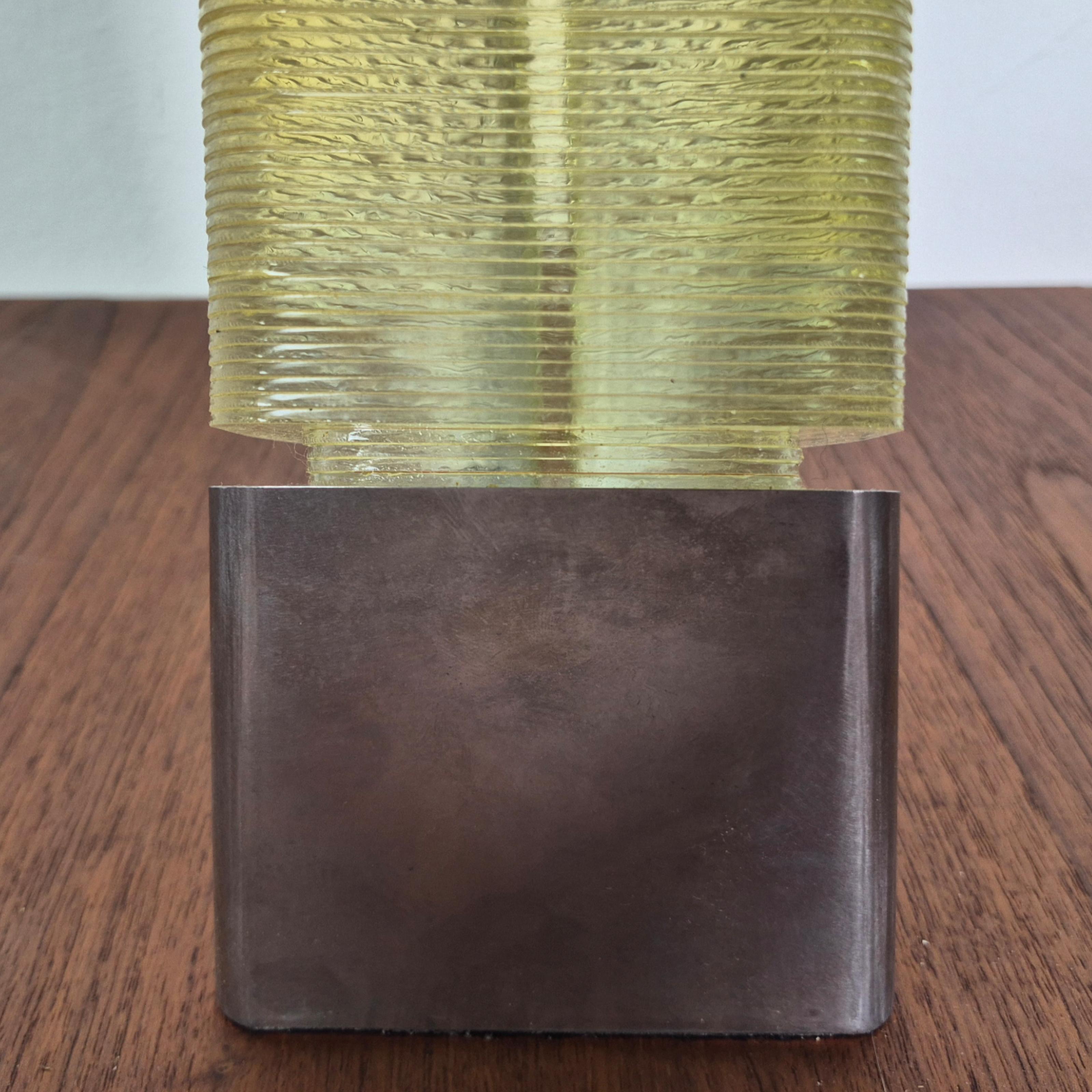 Metal Stacked amber glass sculpture on a metal base, Netherland 1980s For Sale