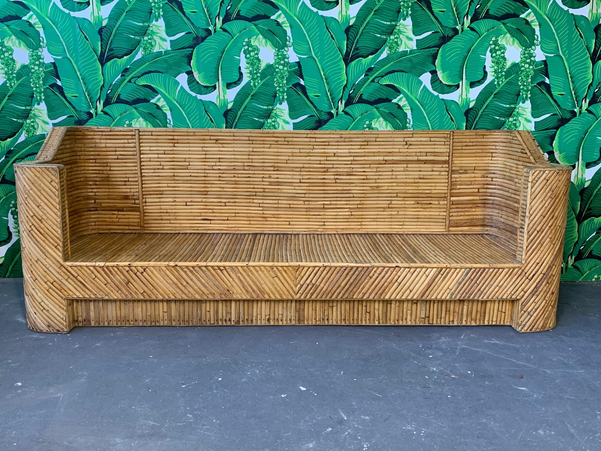 Vintage split pencil reed bamboo sofa, circa 1960s purchased by original owner in Guam. Very heavy, excellent construction, minor signs of age appropriate wear to finish.