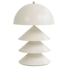 Stacked Bone and Brass Powder-Coated Table Lamp with Peekaboo Silver Leaf Shade