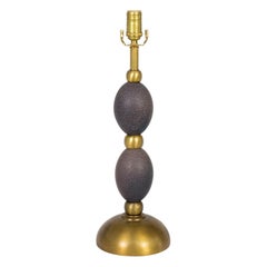 Stacked Emu Eggs & Brass Lamp