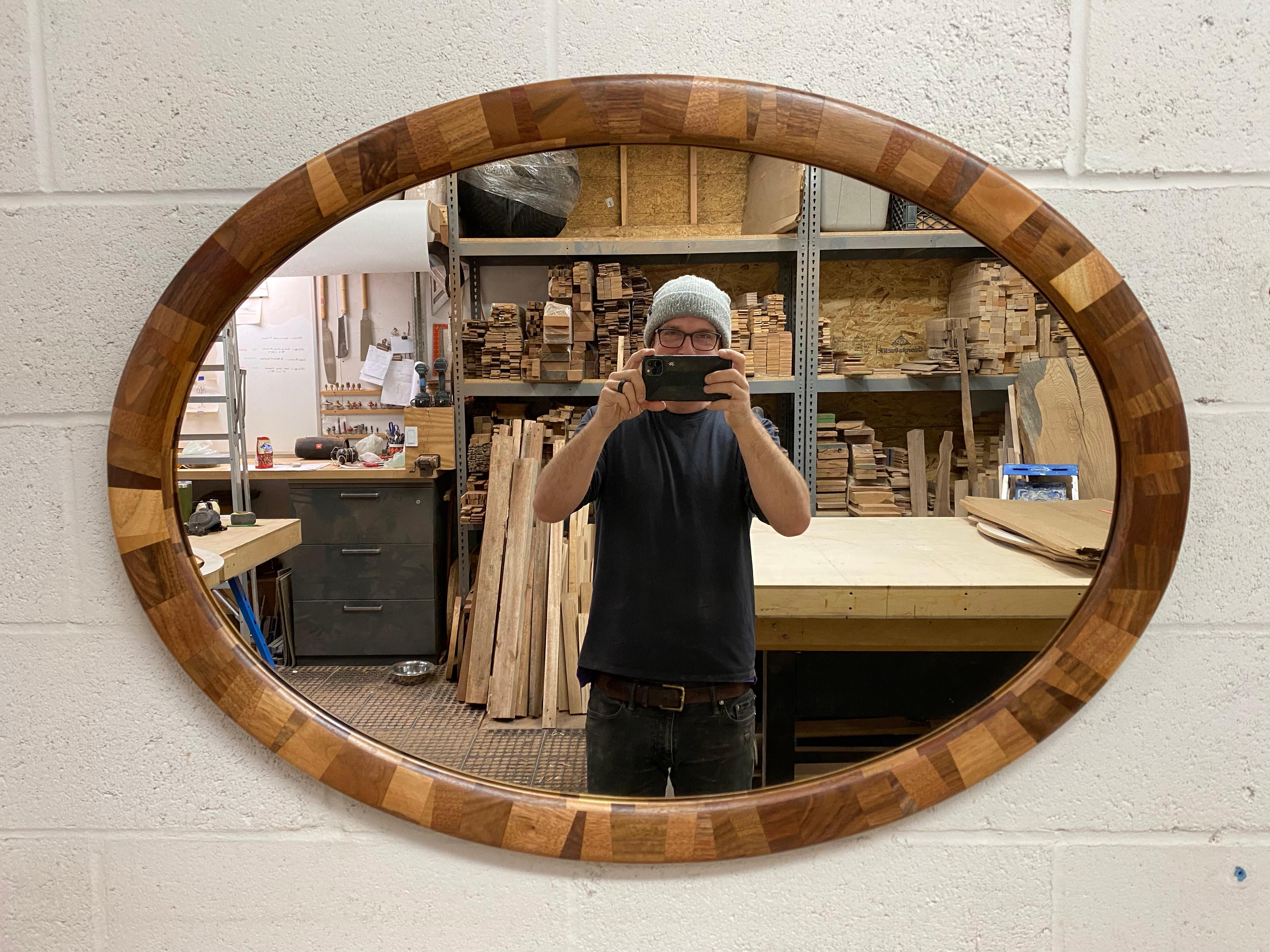 wooden oval mirror