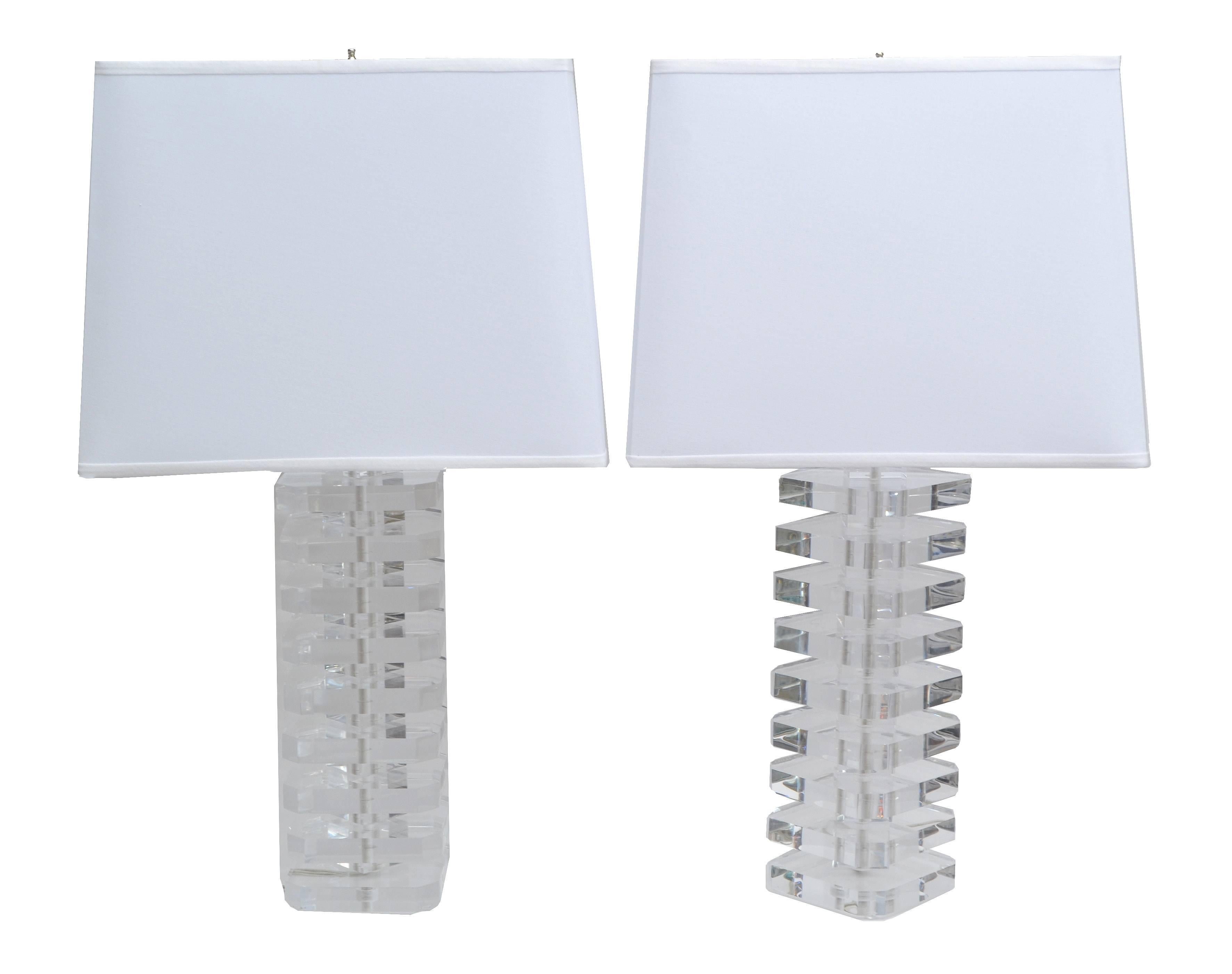 Pair of stacked clear Modern Lucite table lamps.
Nickel hardware with expandable double cluster sockets and pull cords.
Made to order. 1 Pair in Stock.
Wired for the U.S. and each takes two E26 60W-max bulbs.
Measures: 32.5 inches H to top of