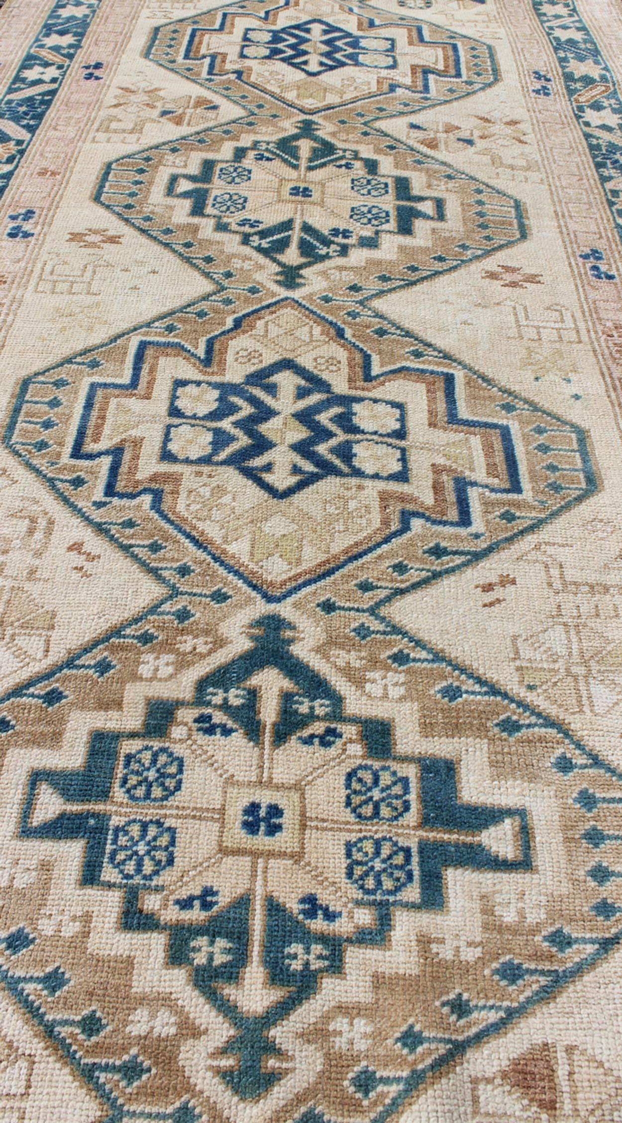 Early 20th Century Stacked Medallion Antique Turkish Oushak Rug in Teal, Ivory, Cream and Nude For Sale