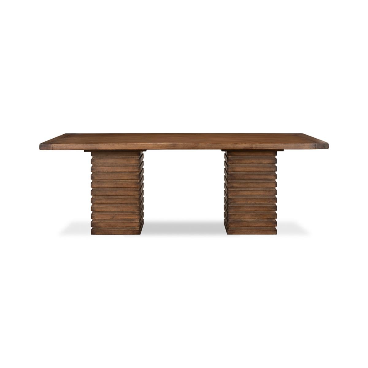 Stacked Modern dining table is made of pine with a mahogany stain finish. The breadboard top sits on twin column pedestals with a modern geometrically stacked design.

Dimensions: 87