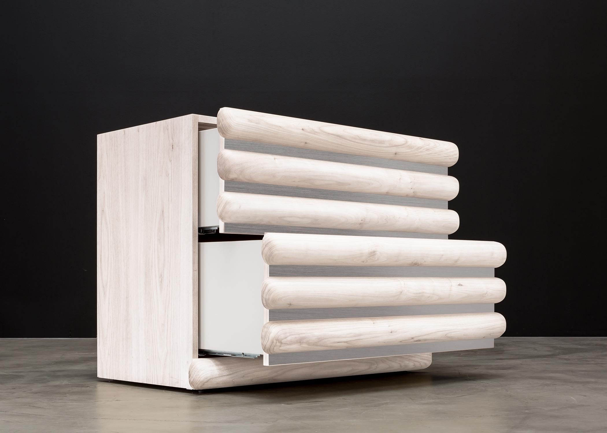 STACKED NIGHTSTAND - Modern Bleached White Oak with Smoked Chrome

The Stacked Nightstand is a beautifully crafted piece of modern furniture that combines functionality and style. It features a bleached white oak body with a sleek and sophisticated