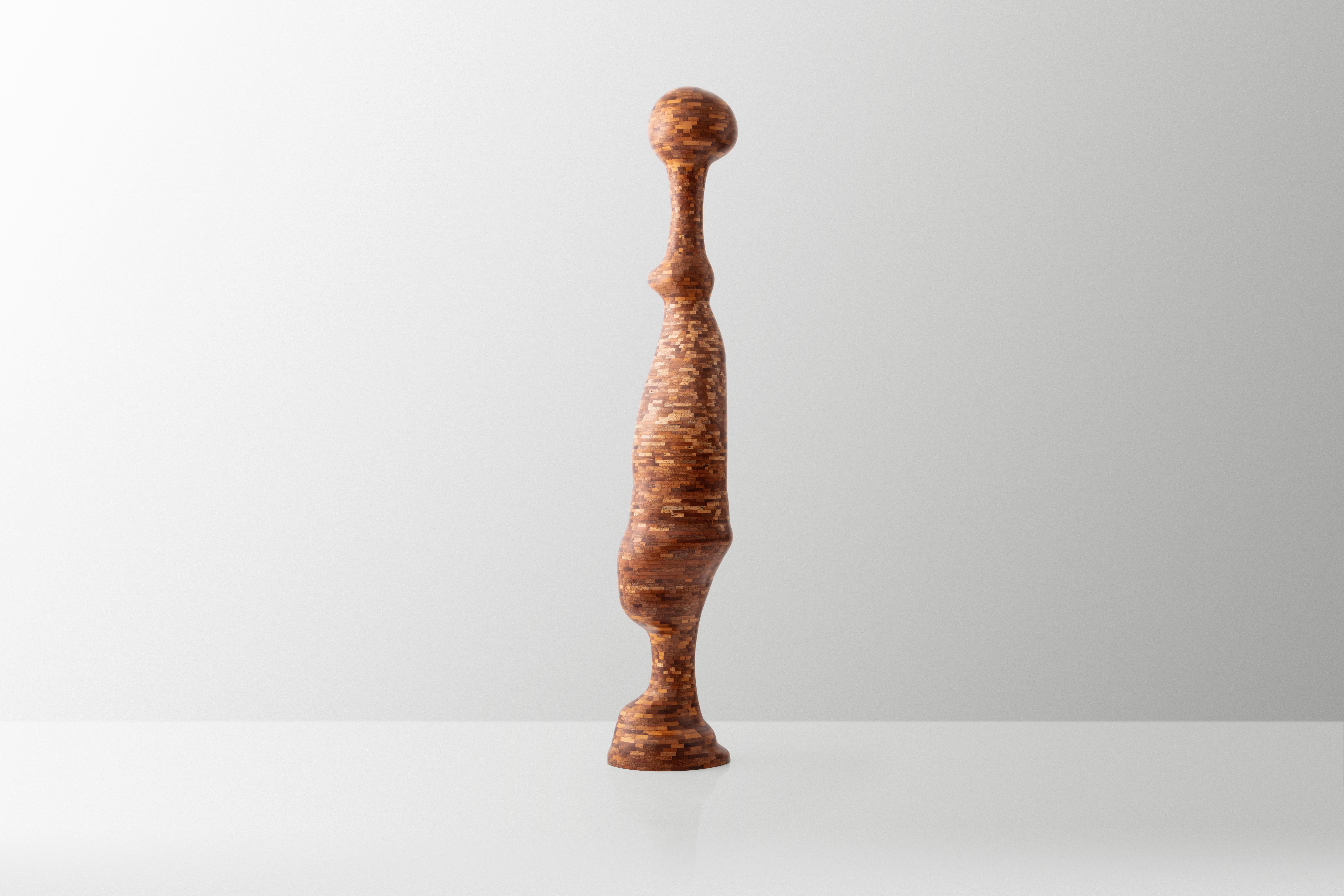 This is Richard's third free-form exploration using his signature STACKED style. As with all of his work, this sculpture was built, sculpted, and finished entirely by hand. To the confusion of many, there is no lathe work involved. The desired