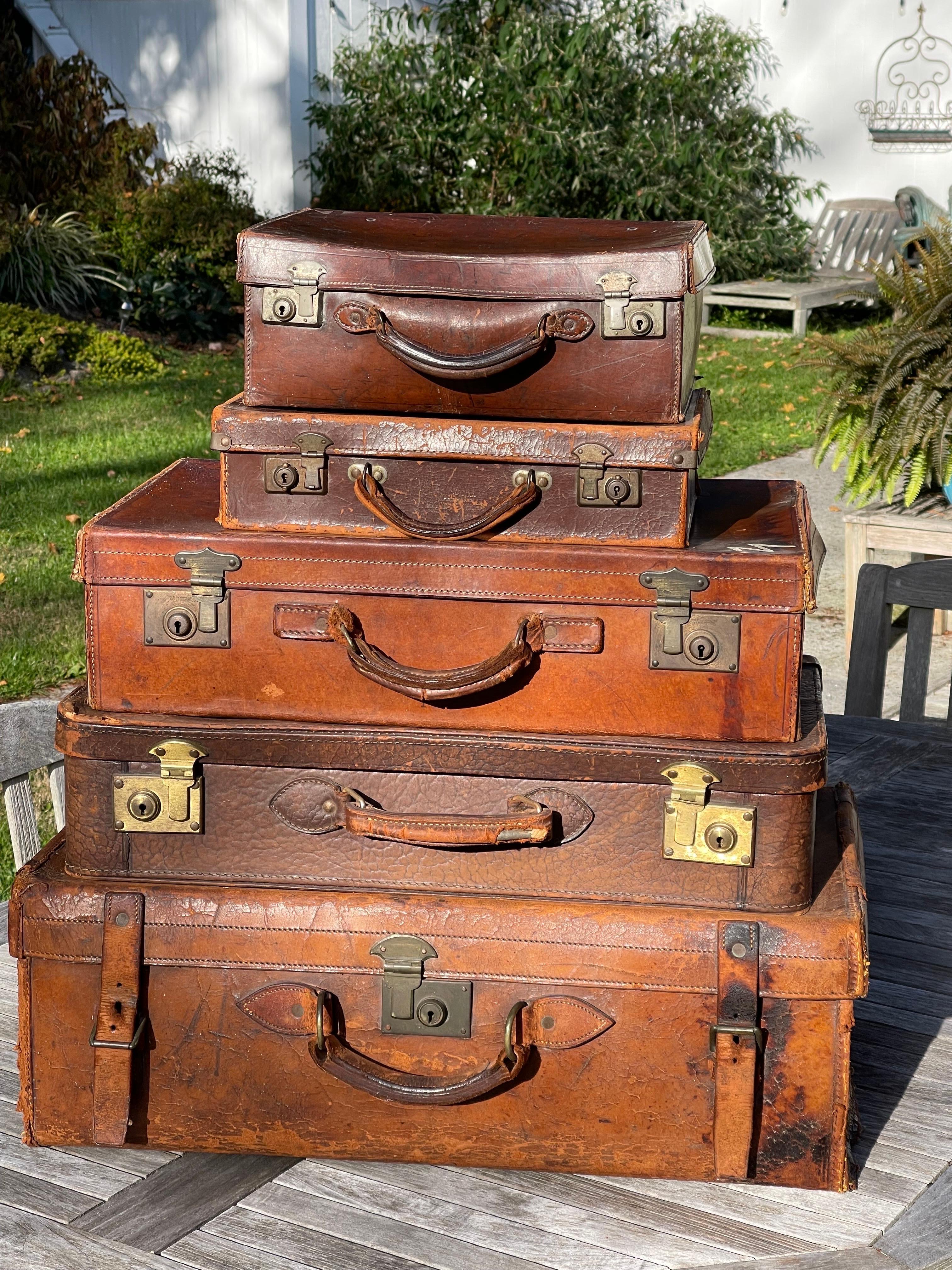 Stacked Set of Five Antique Leather Suitcases or Trunks For Sale 8