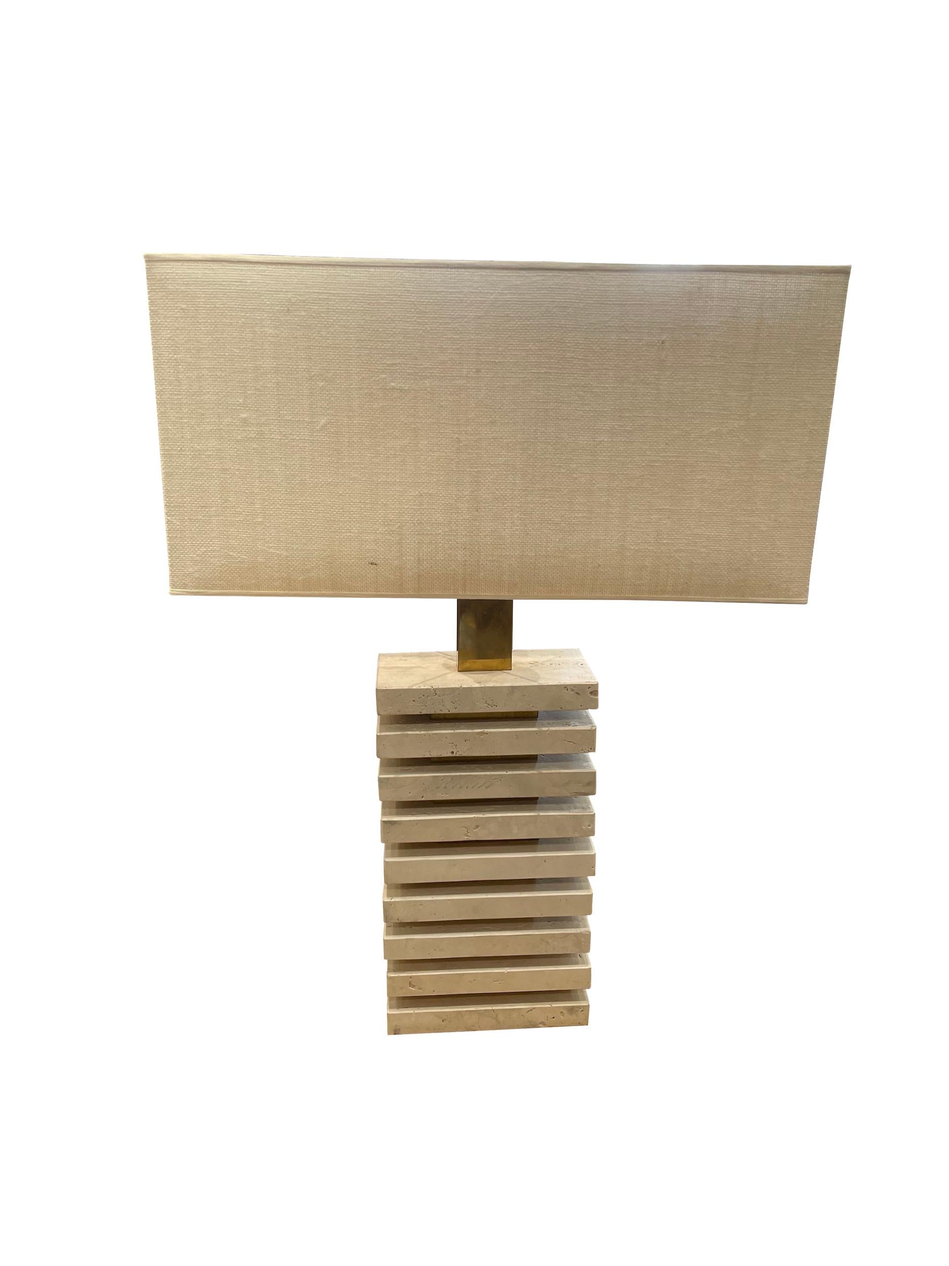 Contemporary French pair stacked rectangular pieces of travertine lamps.
New rectangular shades.
Measures: Base 8