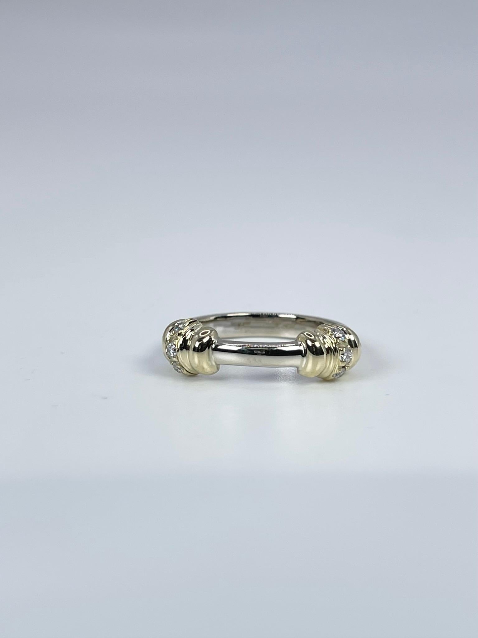 Stunning diamond ring, stacking modern style in 14KT white gold.

GRAM WEIGHT: 4.65gr
GOLD: 14KT white/yellow gold

NATURAL DIAMOND(S)
Cut: Round Brilliant 
Color: G-H (average)
Clarity: SI (average)
Carat: 0.12ct
Size: 7 (can be re-sized)
Item#: