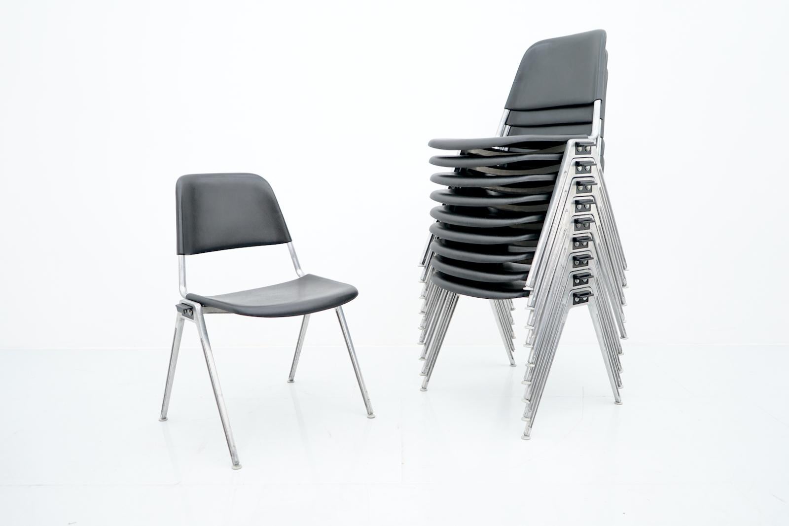One of ten stacking chairs Model 1601 by Don Albinson for Knoll International. Black plastic seat and backrest, aluminum base. 
Good to very good condition.
Dimensions: Width: 19.68 in. ( 53 cm) Depth: 19.68 in. (54 cm) Height: 30.31 in. (81 cm)