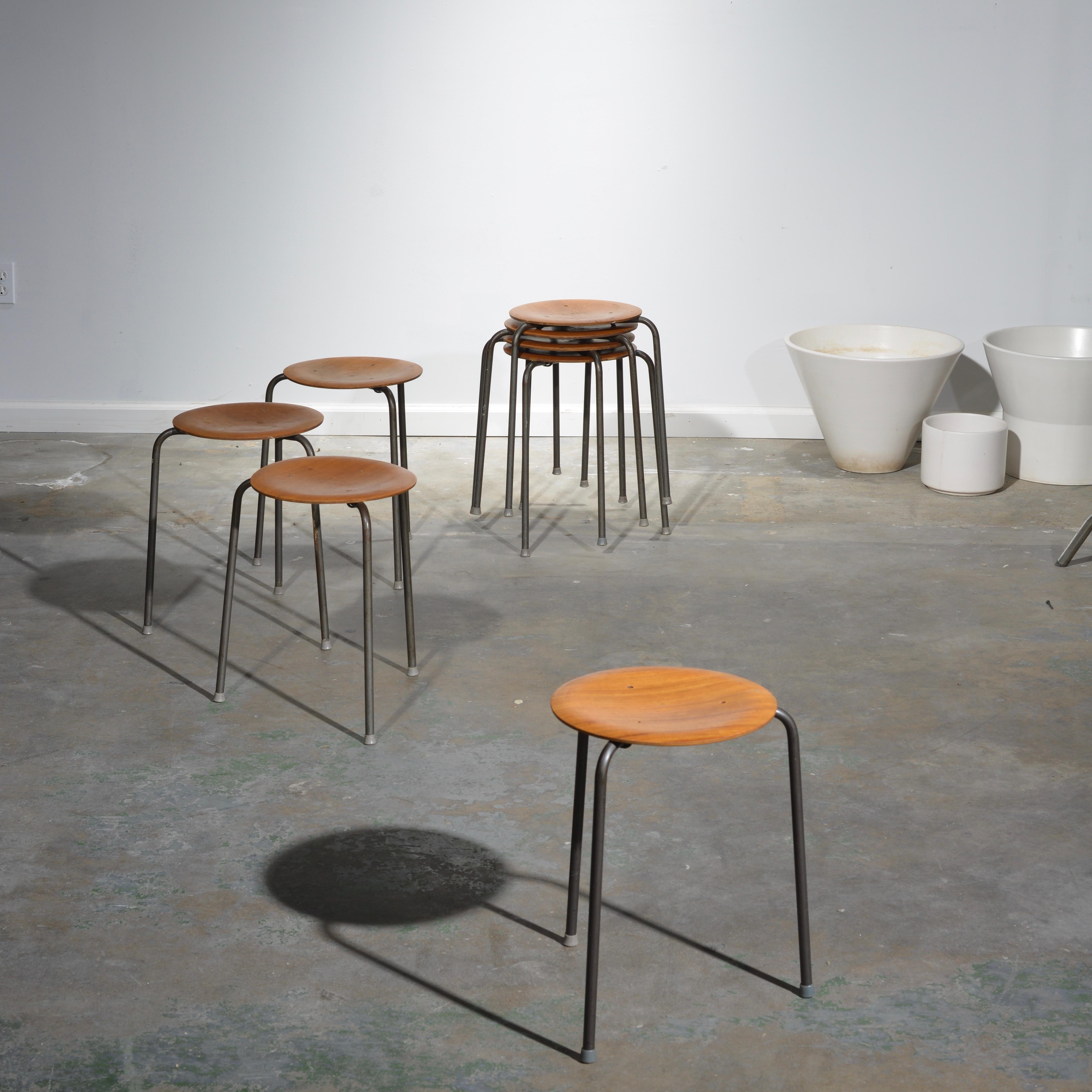These are great stacking stools by Arne Jacobson. We have 12 in stock. Price is per stool.