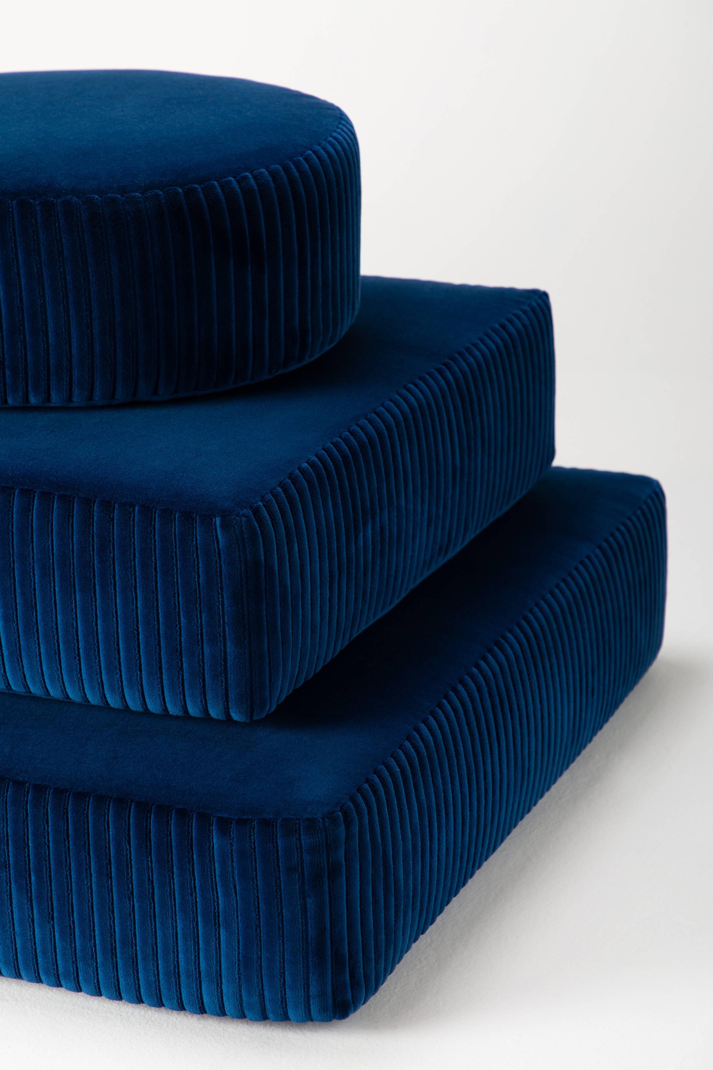 The stacks bench is an elegant interpretation of stacked meditation stones and offers the functionality of meditation cushions. Upholstered in a luxurious velvet, each layer can be removed to provide the opportunity for a different seated
