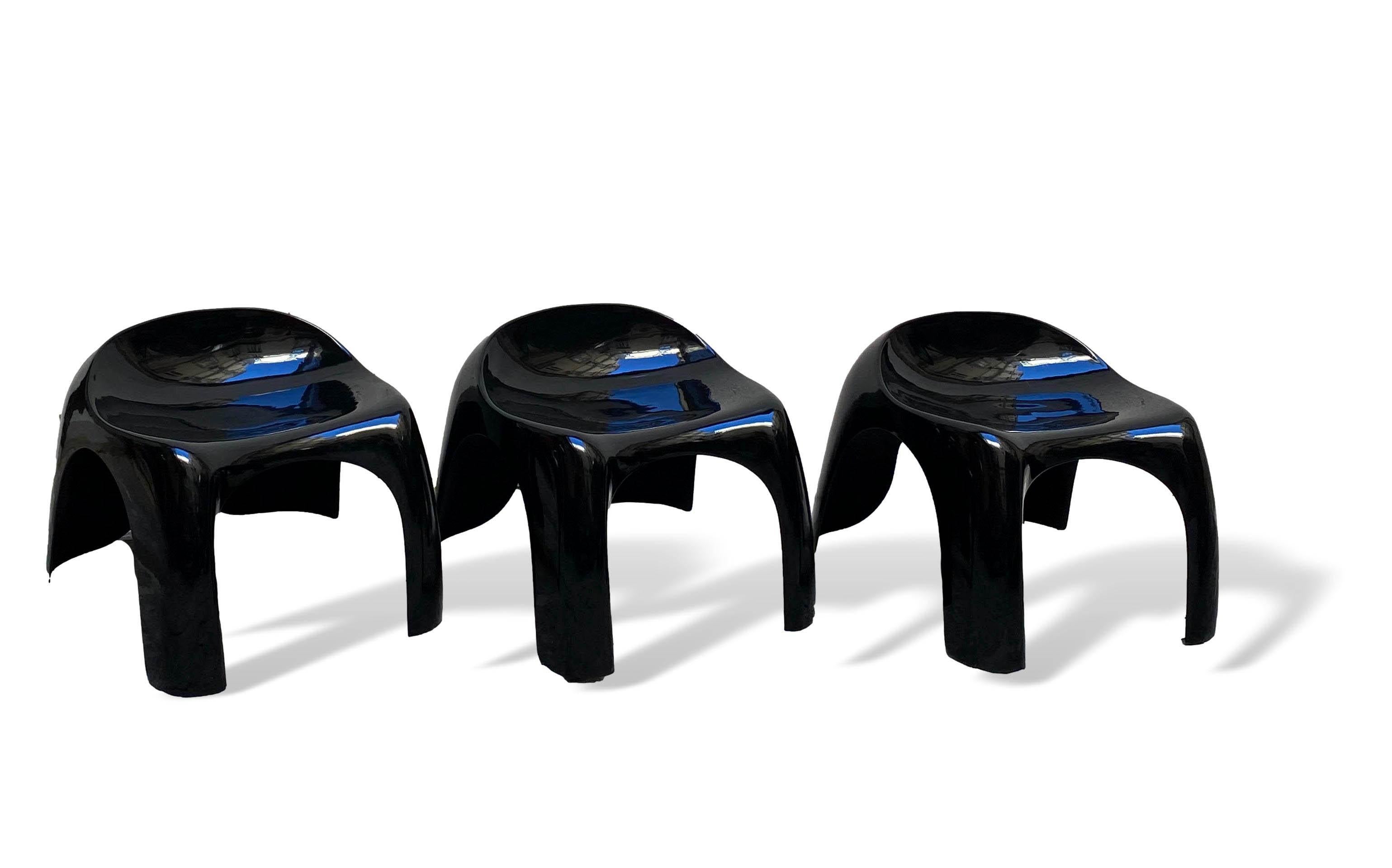 Group of 3 low stools Mod. Efebo - designer Stacy Dukes - production Artemide - years 1966- black color in polyethylene material.