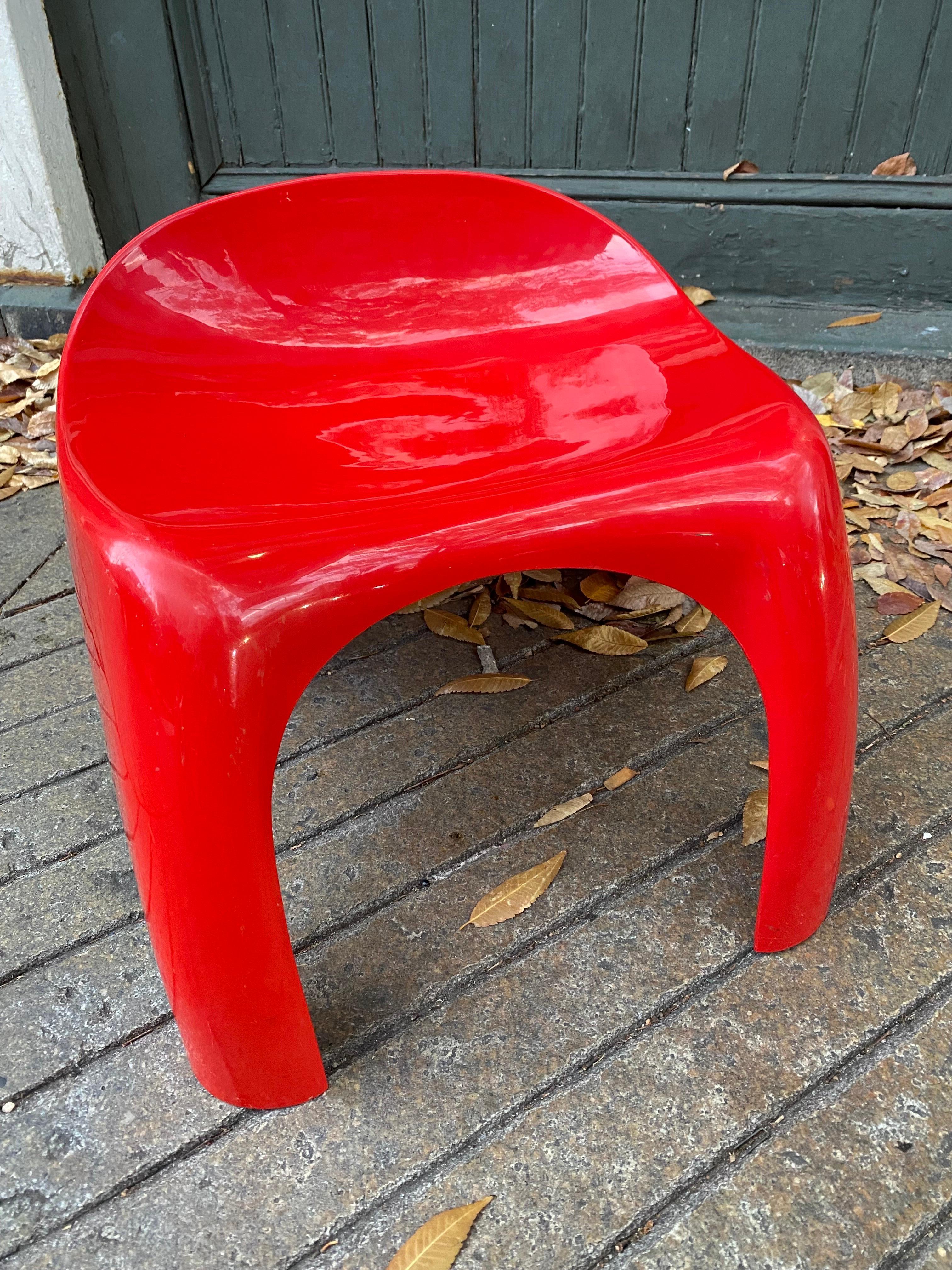 Stacy Dukes Efebo Stool in Red.  3 Stools are available.  Plastic polishes up very well, shows some minor scratches but pretty good shape for 60's plastic!  These are the larger of the sizes, designed for adults.  Stools sit well and surprisingly