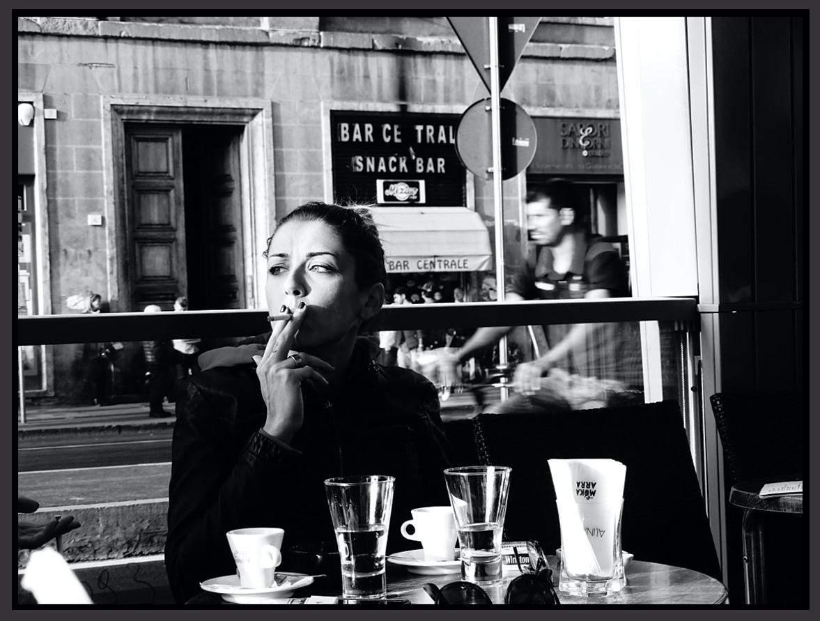 Stacy Widelitz Landscape Photograph - Young Woman in a Cafe, Florence 