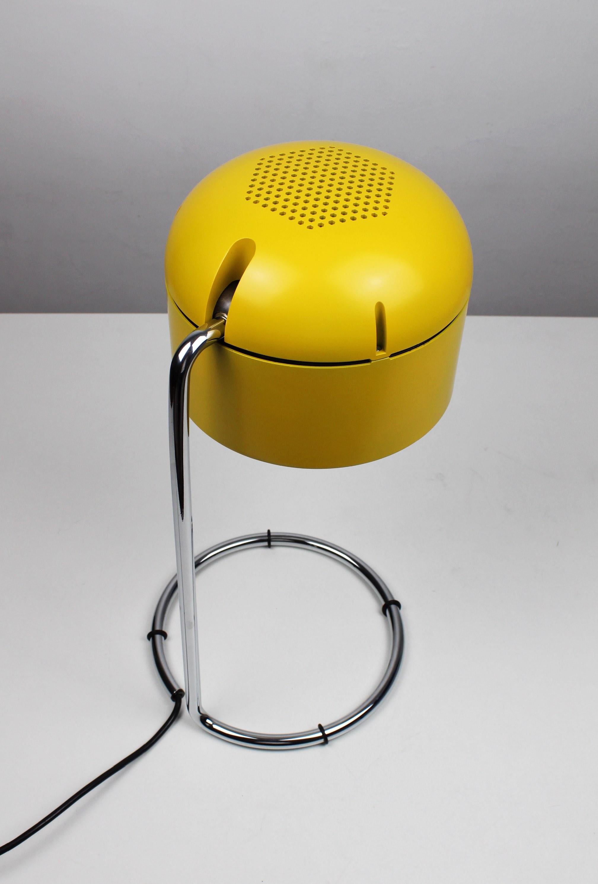 STAFF Yellow Table Lamp: A 1974 Design Classic

The STAFF Yellow Table Lamp, designed in 1974 by Arnold Berges for Staff Germany, is a quintessential piece of mid-century modern design. Produced by the acclaimed German manufacturer STAFF, this lamp