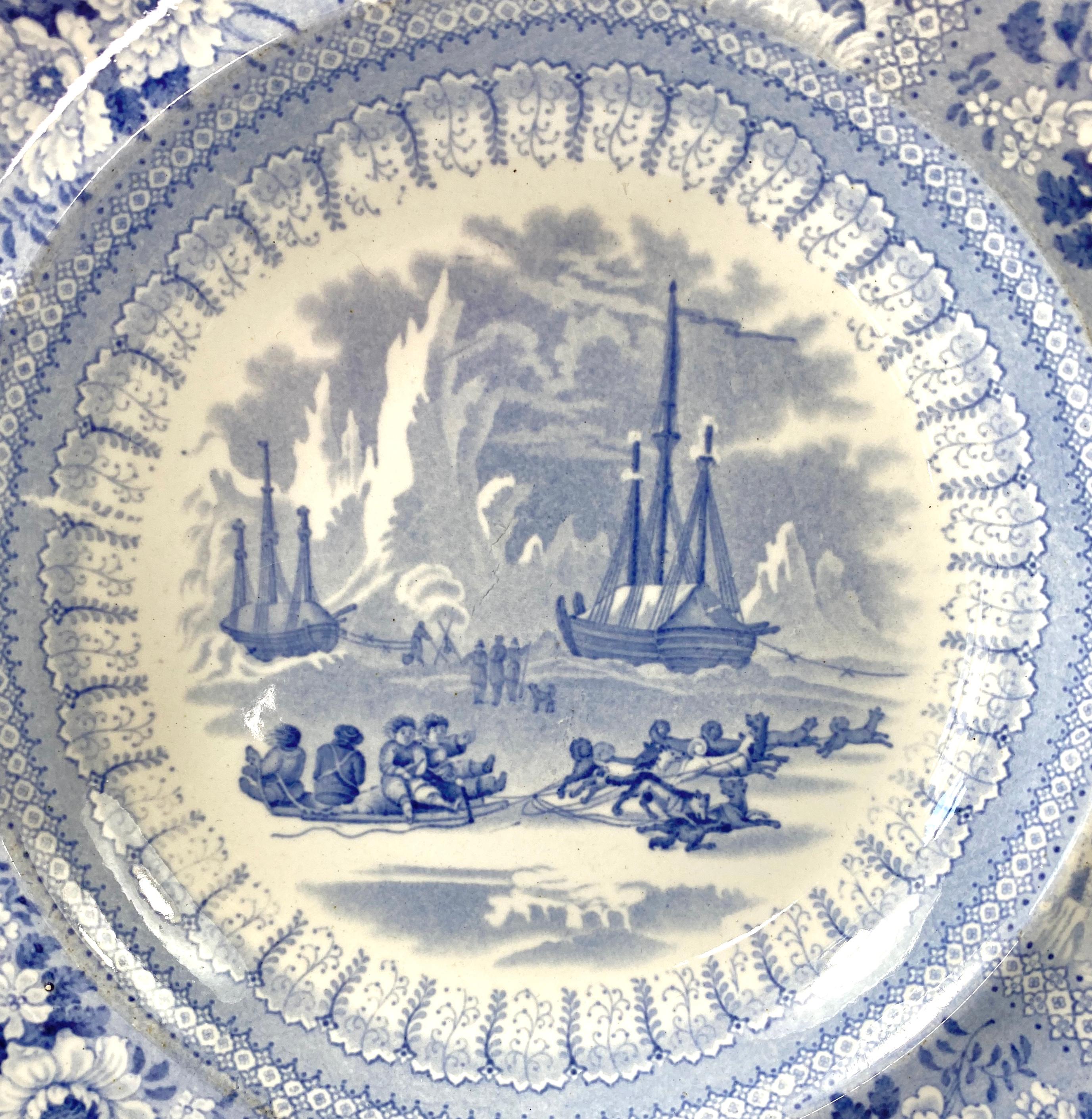 Staffordshire pottery ‘Arctic Scenery’ dish, c. 1835. The Canadian interest dish printed in light blue, with an Arctic scene of explorers on sledges being pulled by dogs, before ships, in a mountainous landscape. The print inspired by the accounts