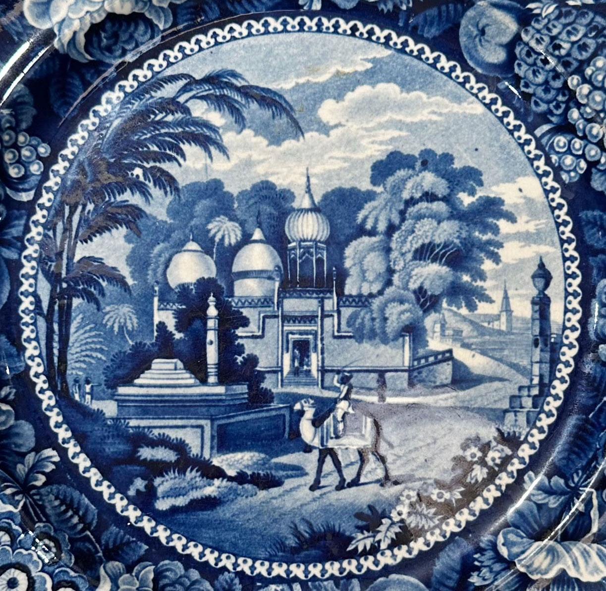 This blue and white transferware plate by Staffordshire is circa 1820, England. 
