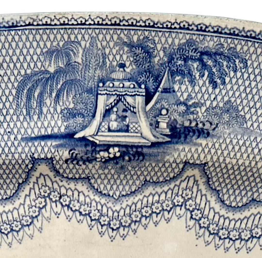 A military scene Staffordshire transferware meat platter. Blue and white with marking on back. Circa 1890s, England.