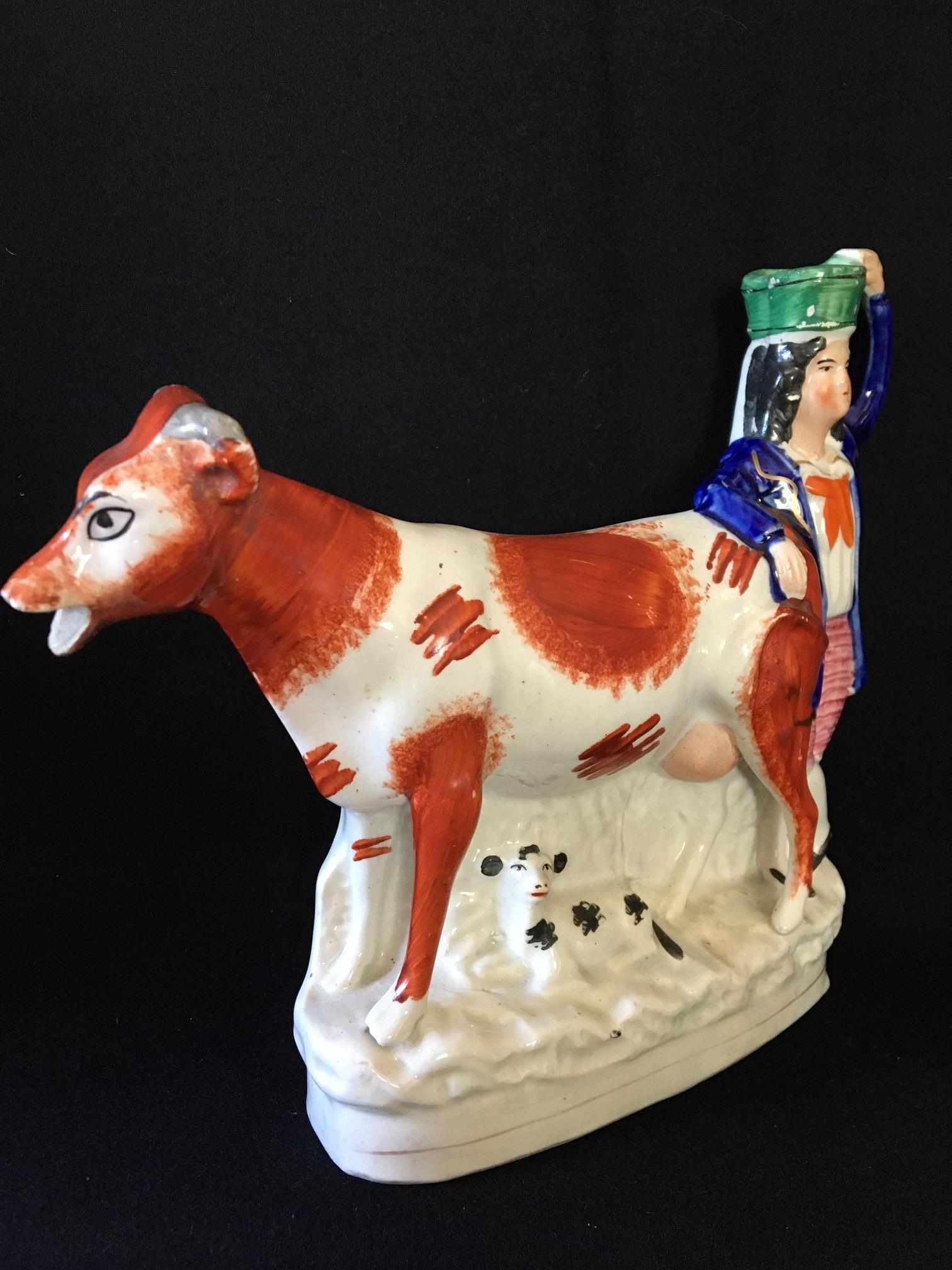 Attractive 19th century English Staffordshire cattle figure, circa 1870.
This delightful figure is in good condition with plenty of crisp color,
no breaks or repairs and with particularly good features of the cows head.
Dimensions 9 ins high. 11