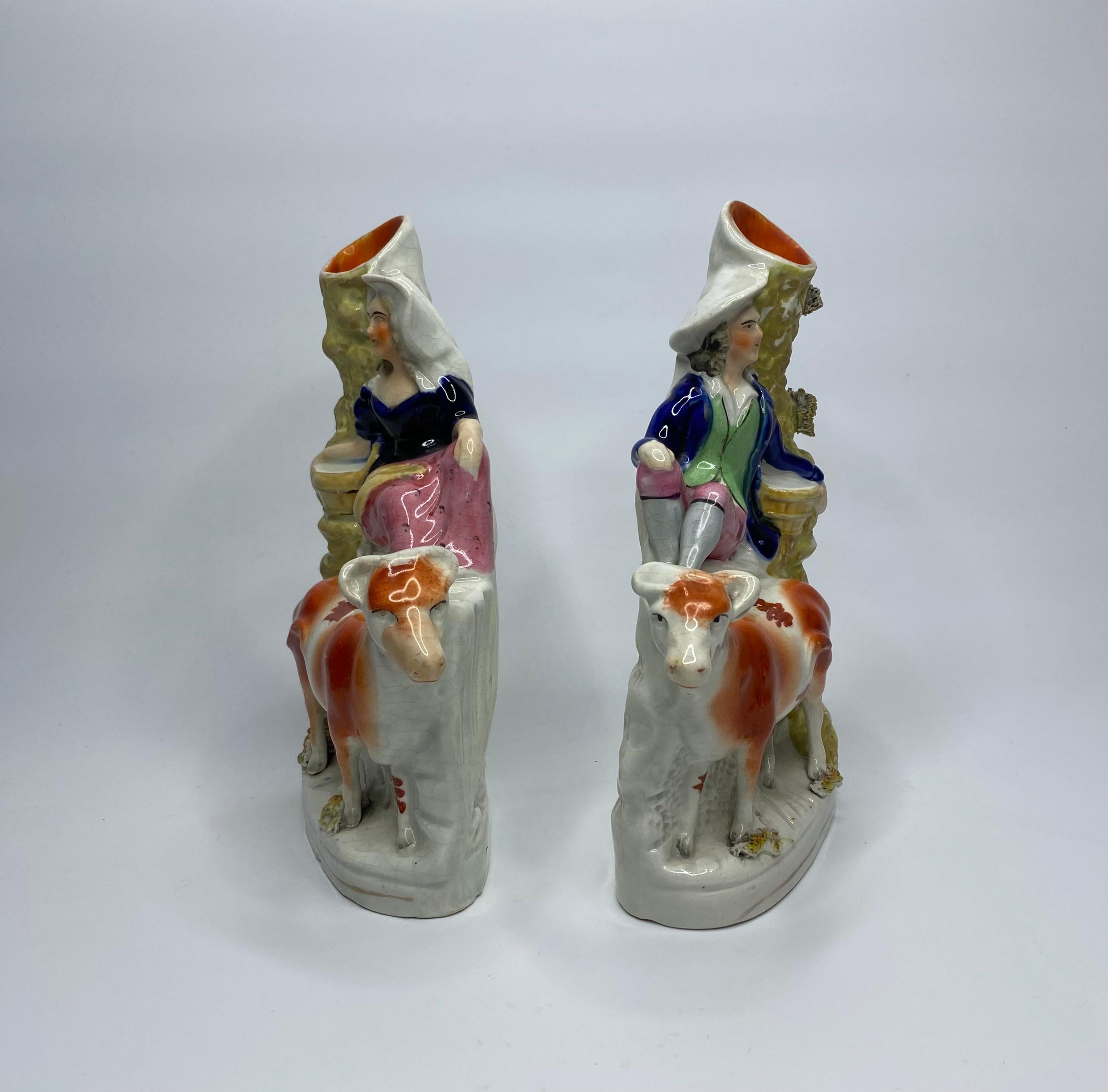 English Staffordshire cow spill vases, c. 1860. For Sale