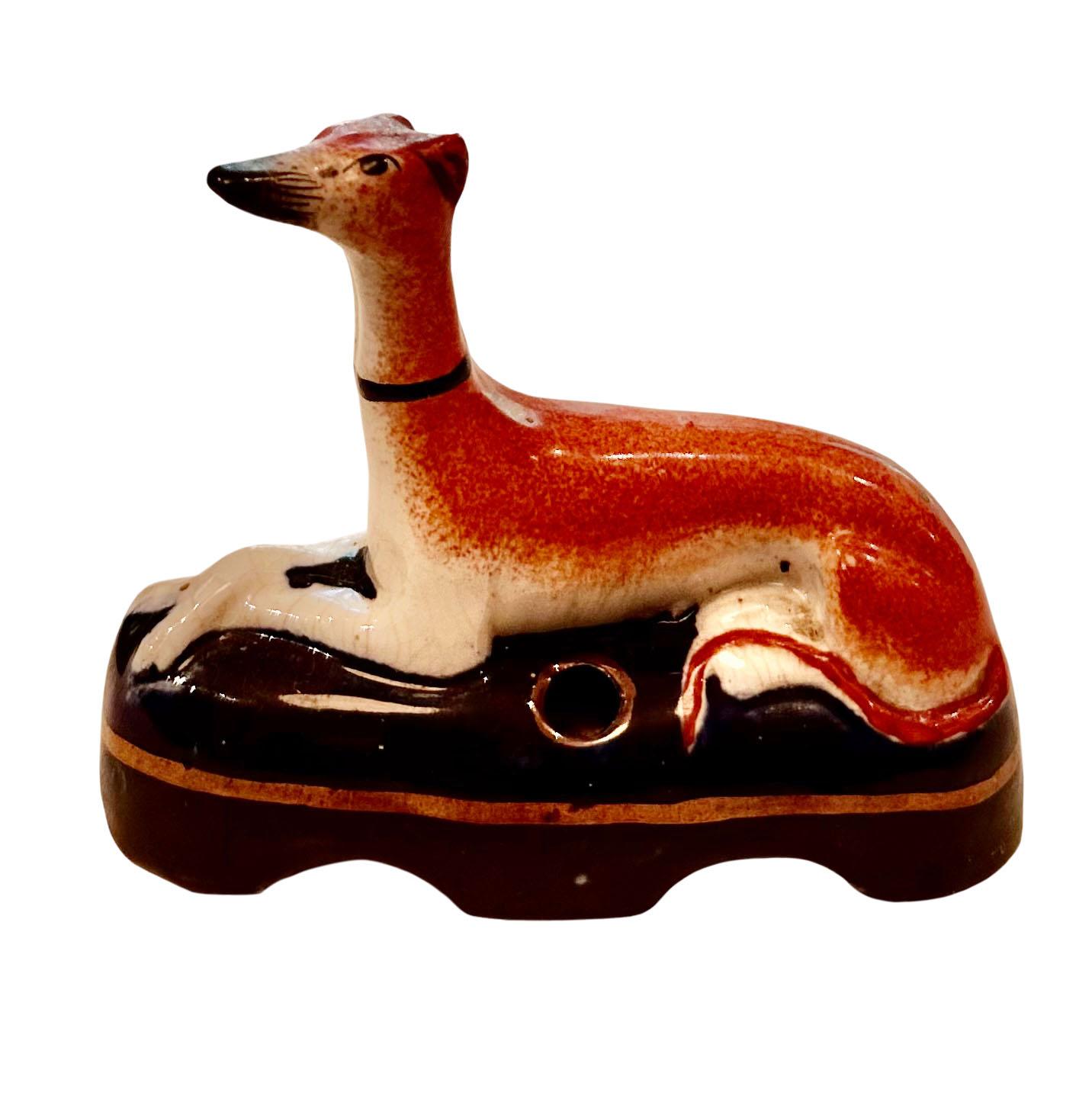 An antique Staffordshire dog, Whippet porcelain inkwell. Circa 1880, England
