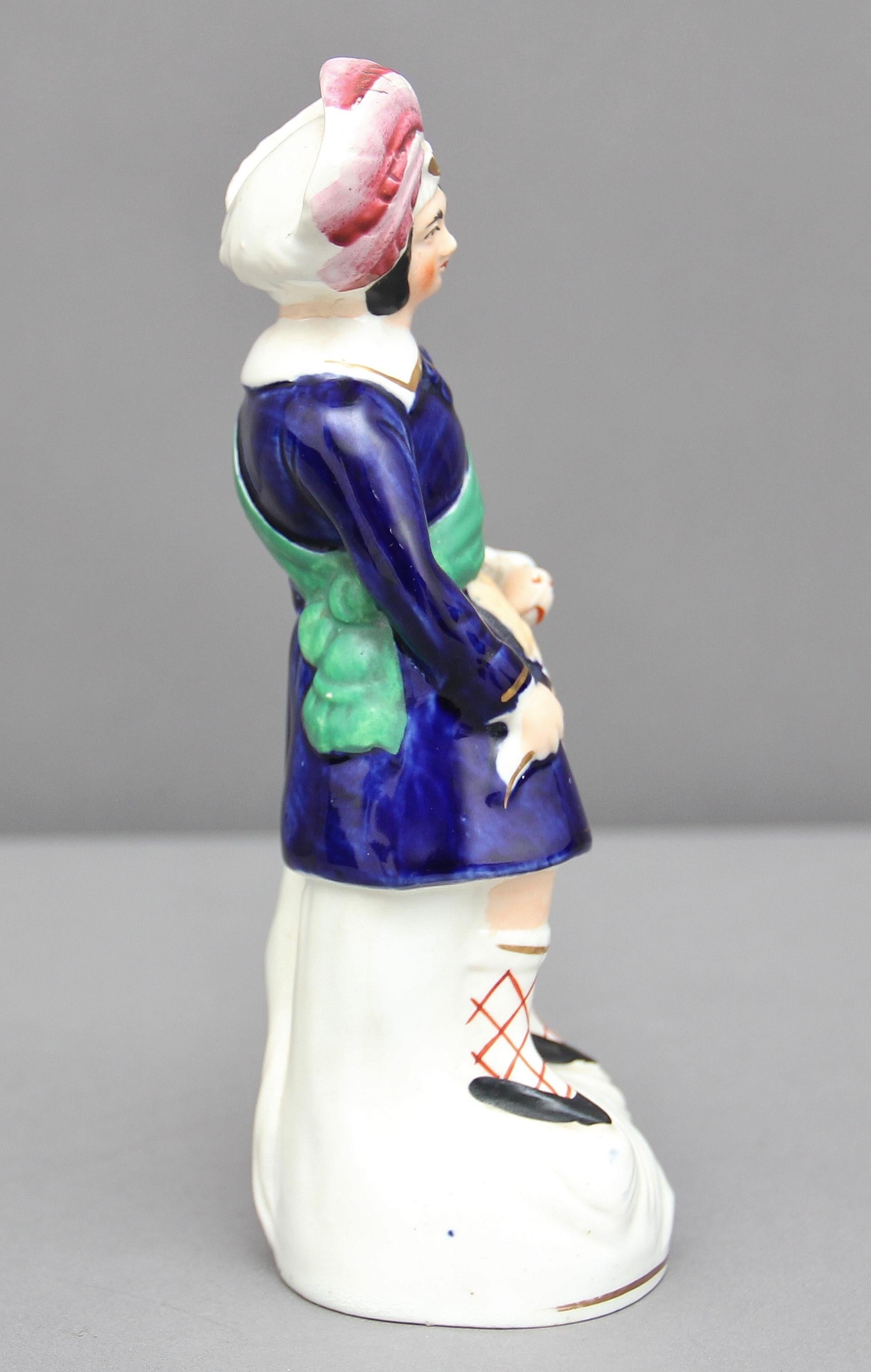 English Staffordshire Figure of a Boy and His Dog