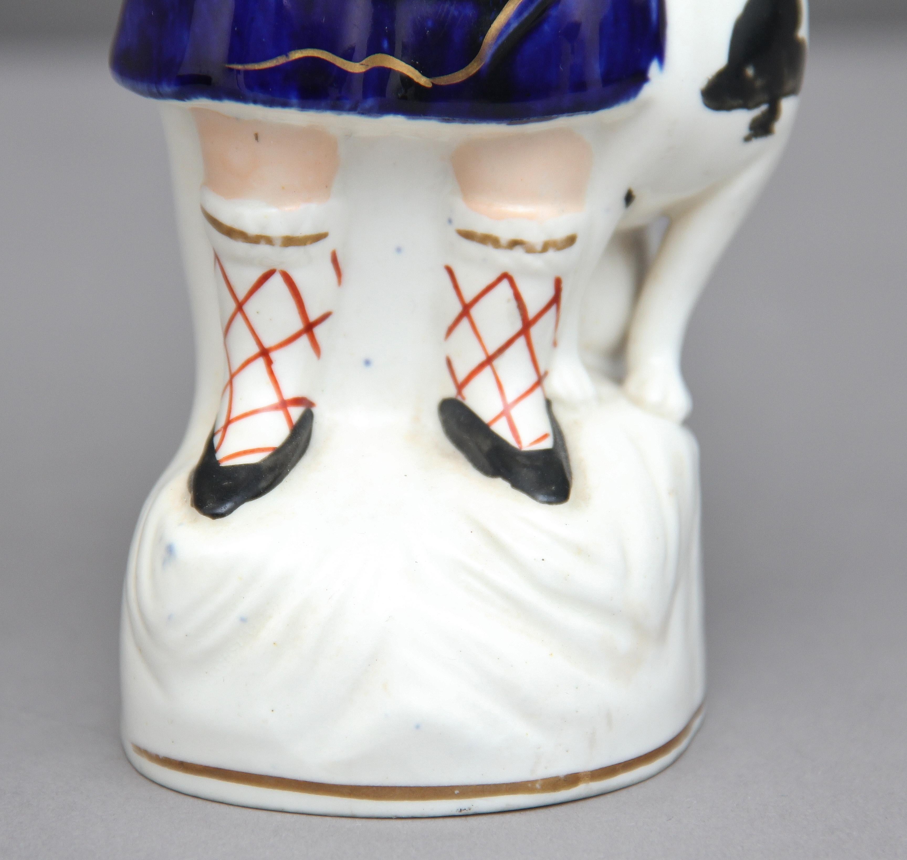 Ceramic Staffordshire Figure of a Boy and His Dog