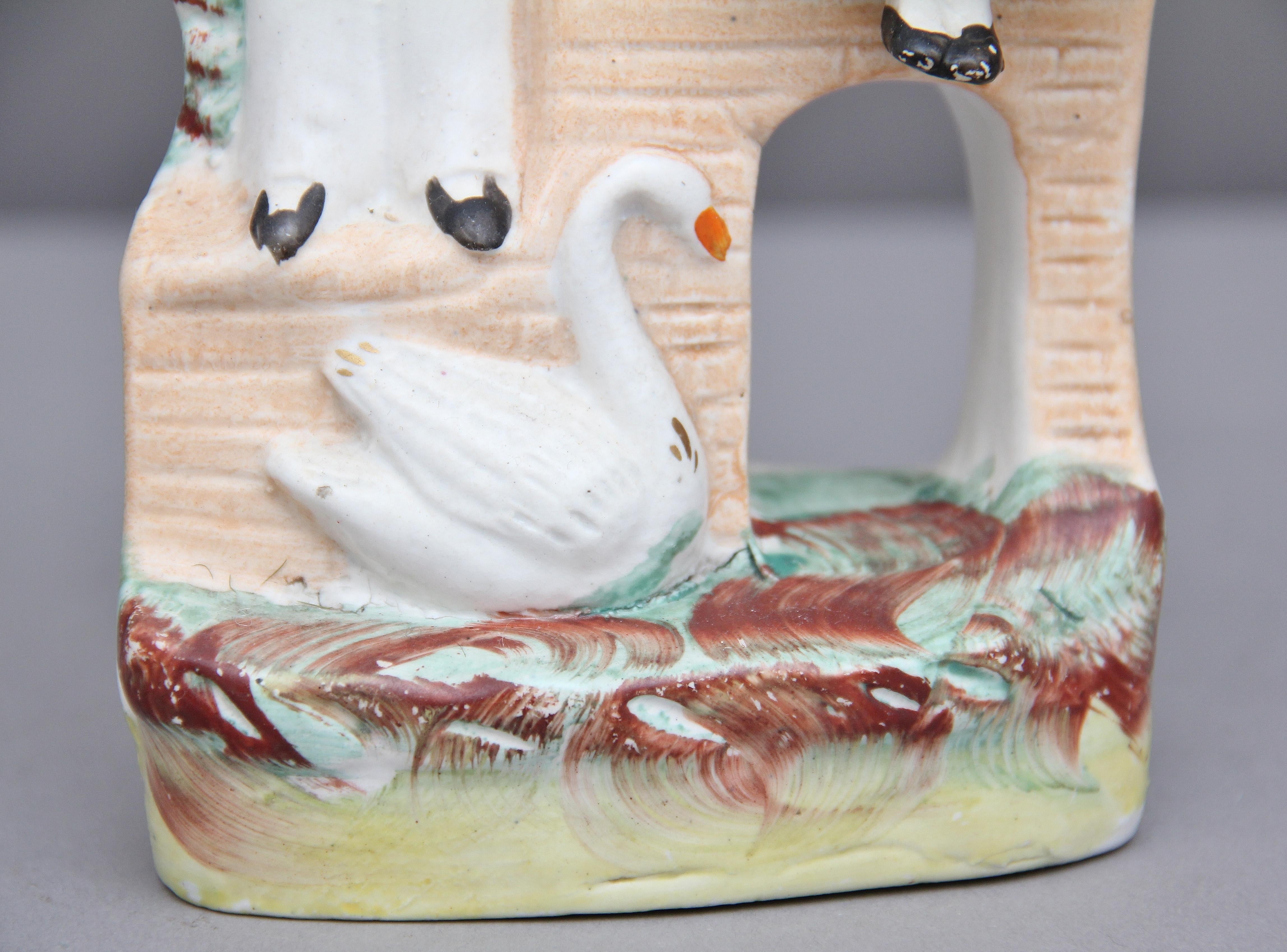Ceramic Staffordshire Figure of a Man, Woman and Swan