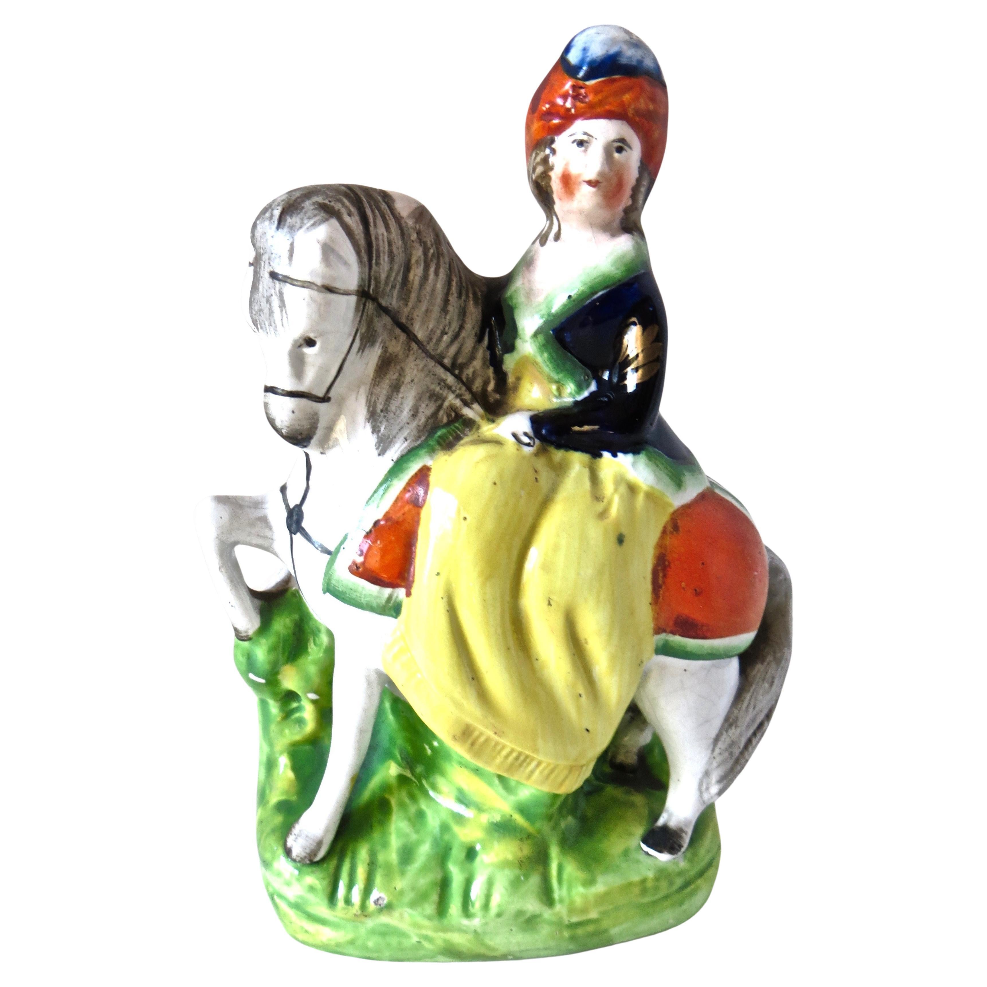 Figurine Staffordshire "Jeune femme en selle sur un cheval". Circa 1885