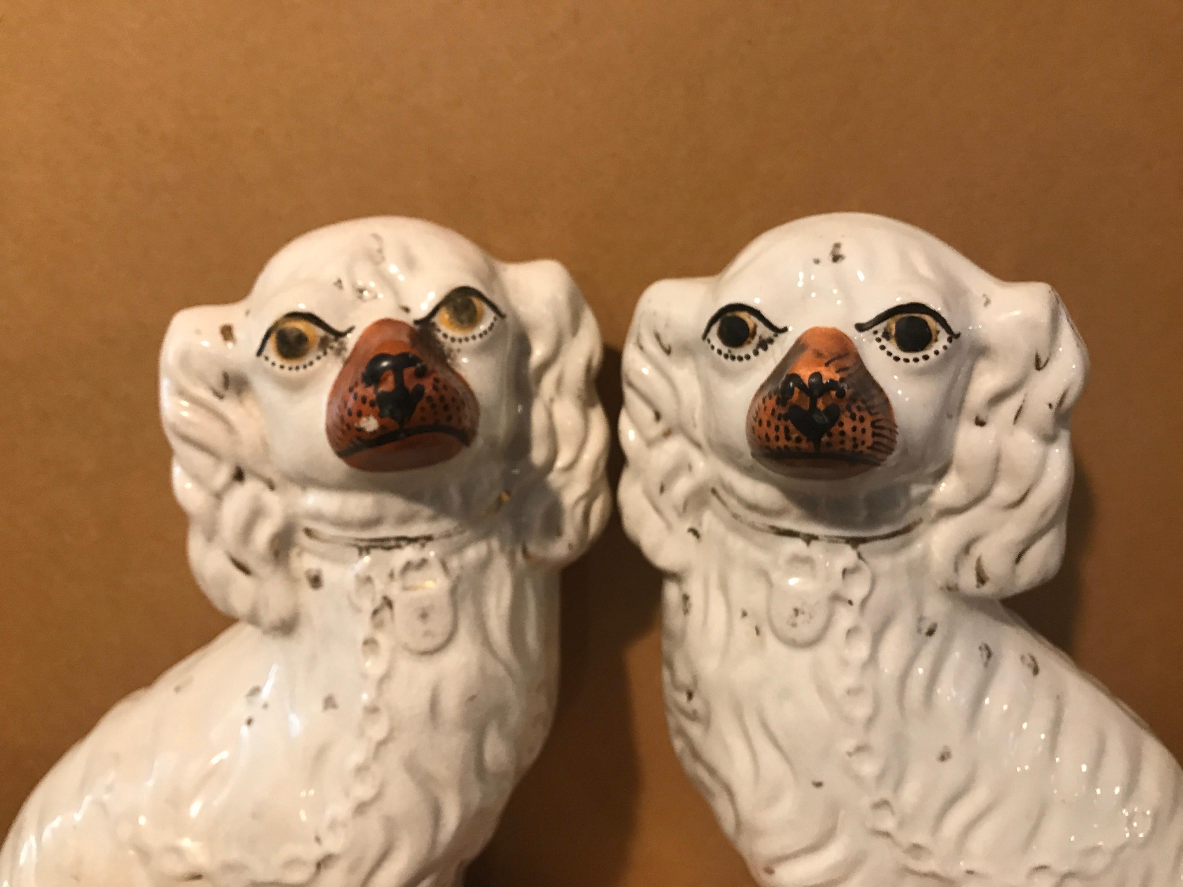 Staffordshire King Charles Spaniels, circa 1850. England. Measures: 12”H x 9” L x 4” D. No cracks or chips or signs of restoration. Signs of age are present, but overall in very good condition.