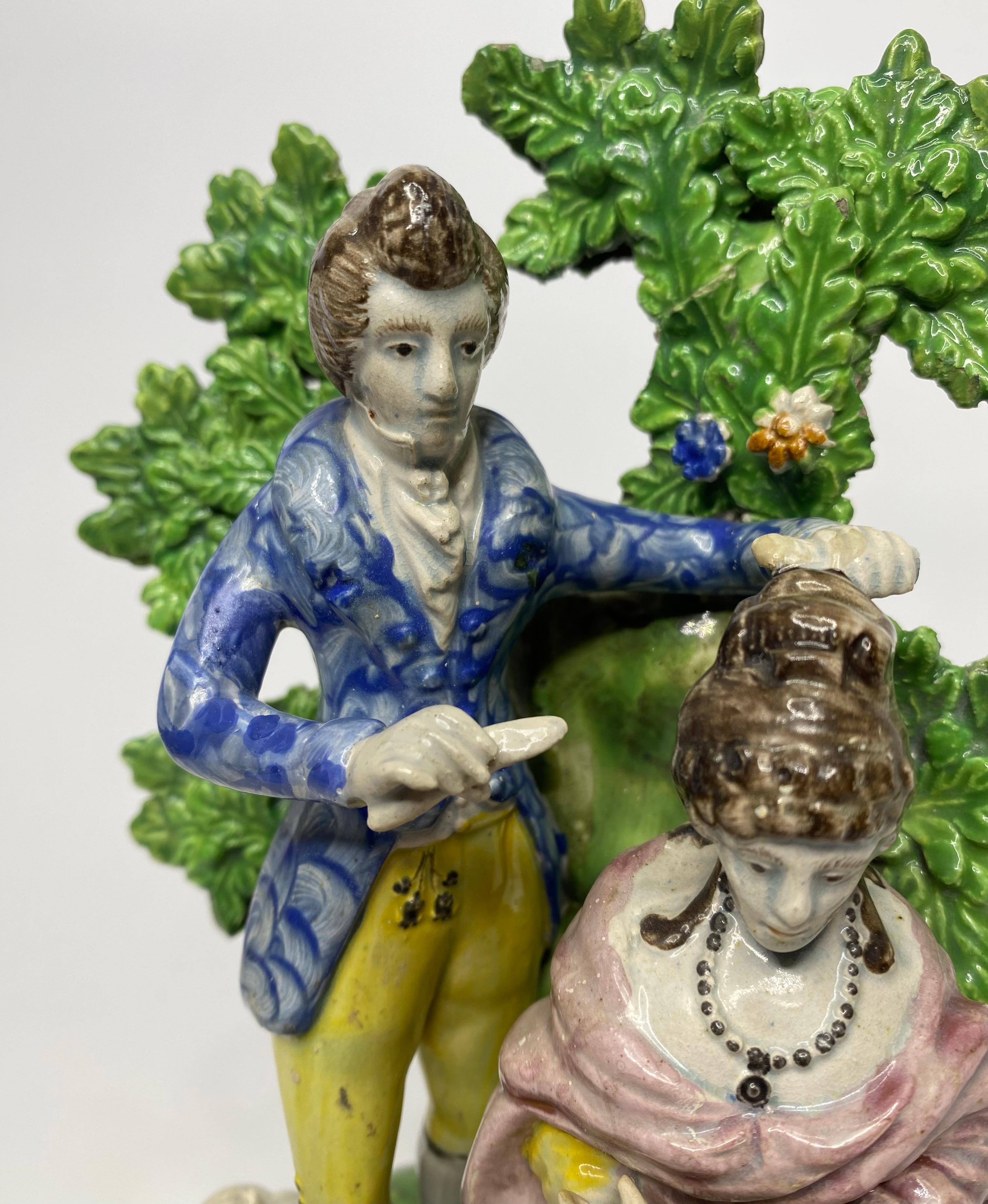 Staffordshire pottery bocage group, ‘Hairdresser’, c. 1820. In Good Condition For Sale In Gargrave, North Yorkshire