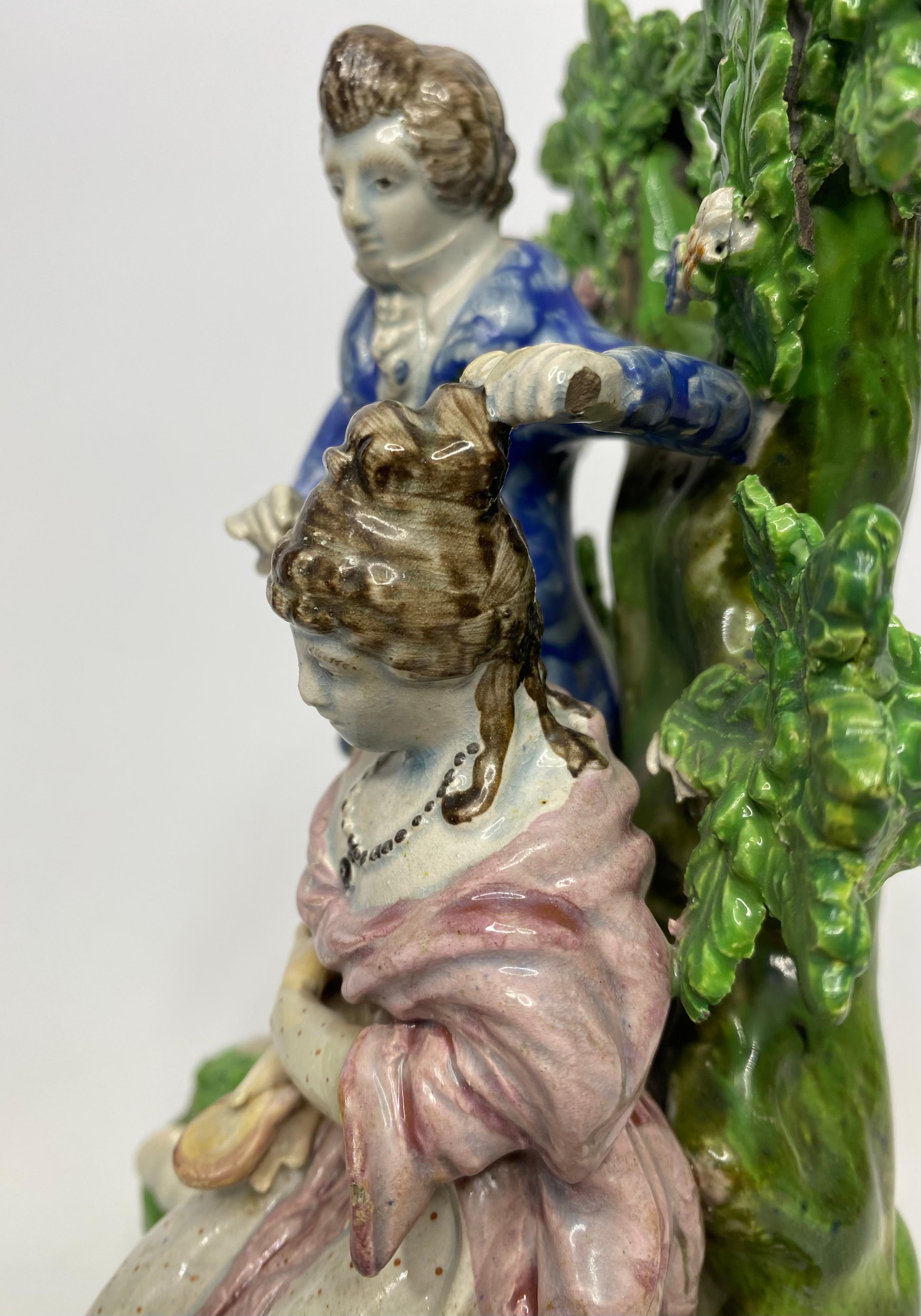 Pottery Staffordshire pottery bocage group, ‘Hairdresser’, c. 1820. For Sale