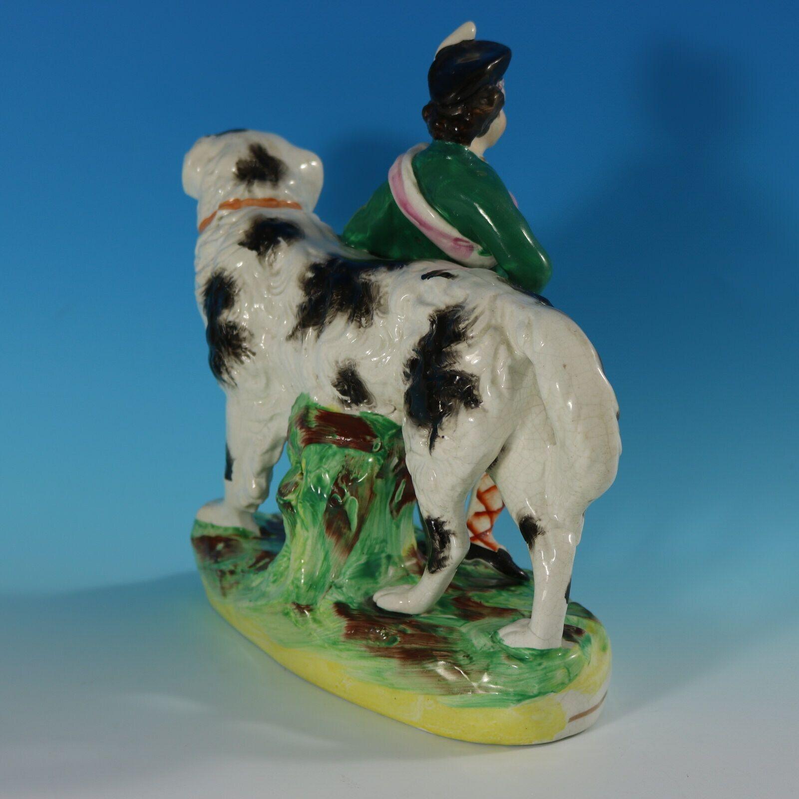 English Staffordshire Pottery Boy with St. Bernard Figure For Sale