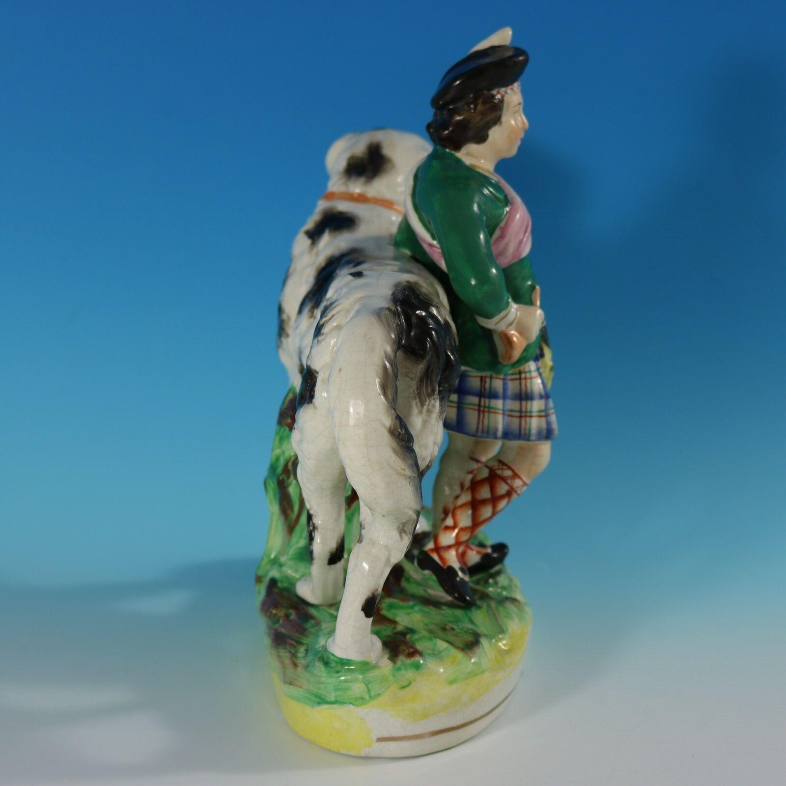 Staffordshire Pottery Boy with St. Bernard Figure In Fair Condition For Sale In Chelmsford, Essex
