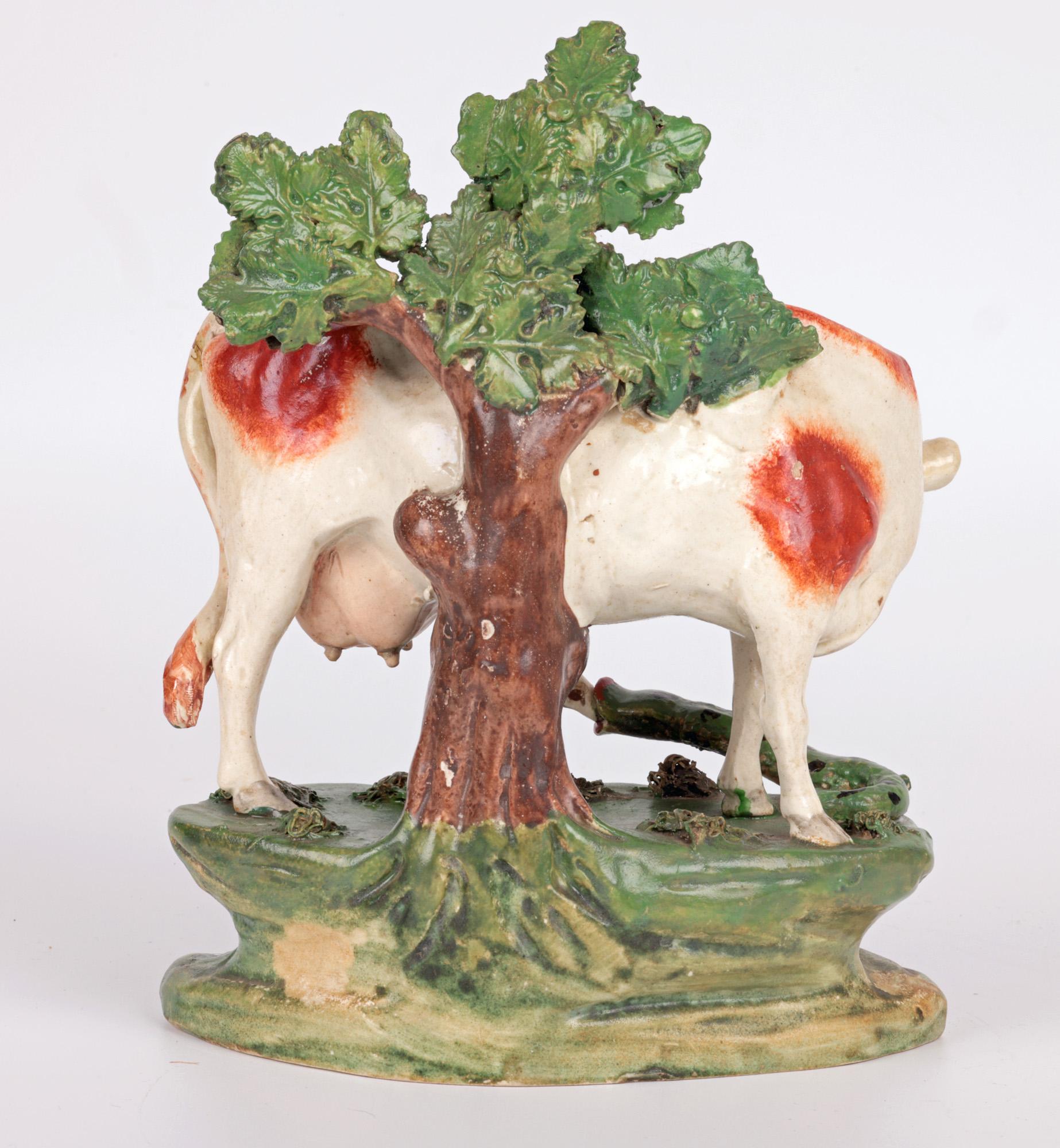 Staffordshire Pottery Cow Attacked by a Snake Pottery Figure 5