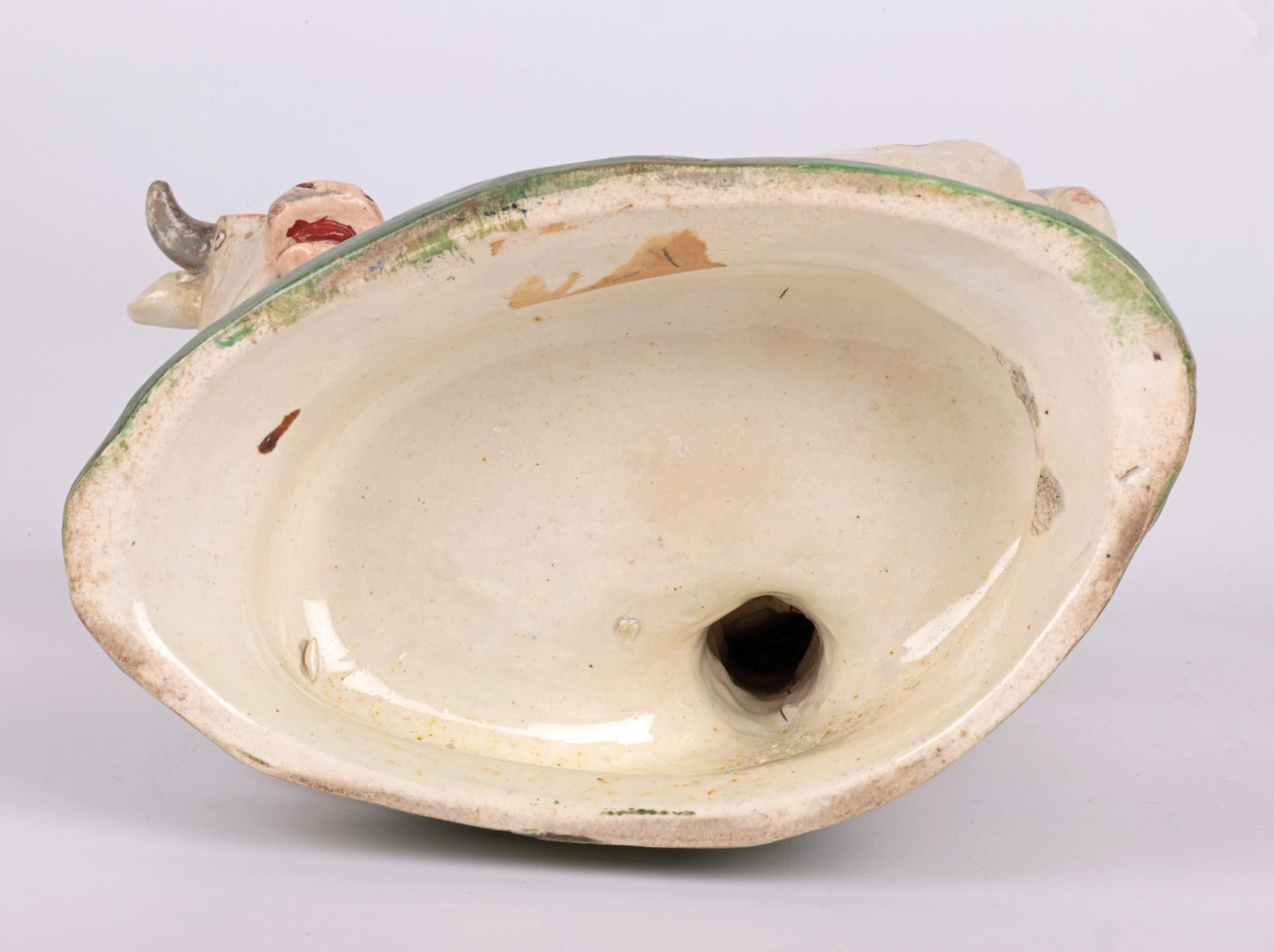 Staffordshire Pottery Cow Attacked by a Snake Pottery Figure 9