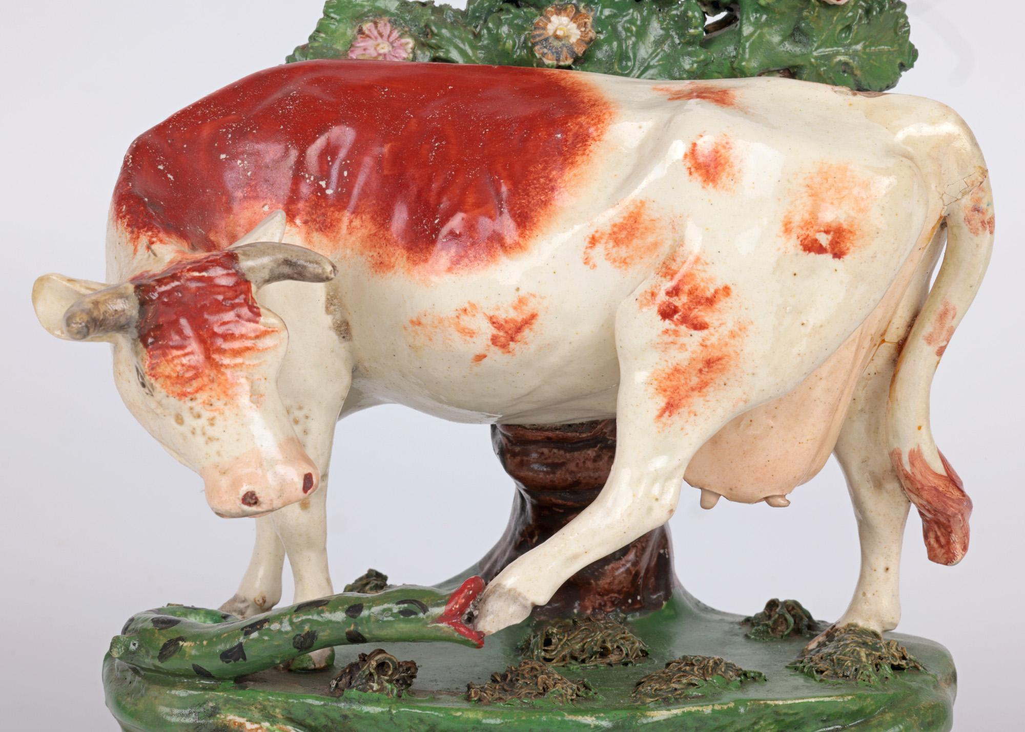 Georgian Staffordshire Pottery Cow Attacked by a Snake Pottery Figure
