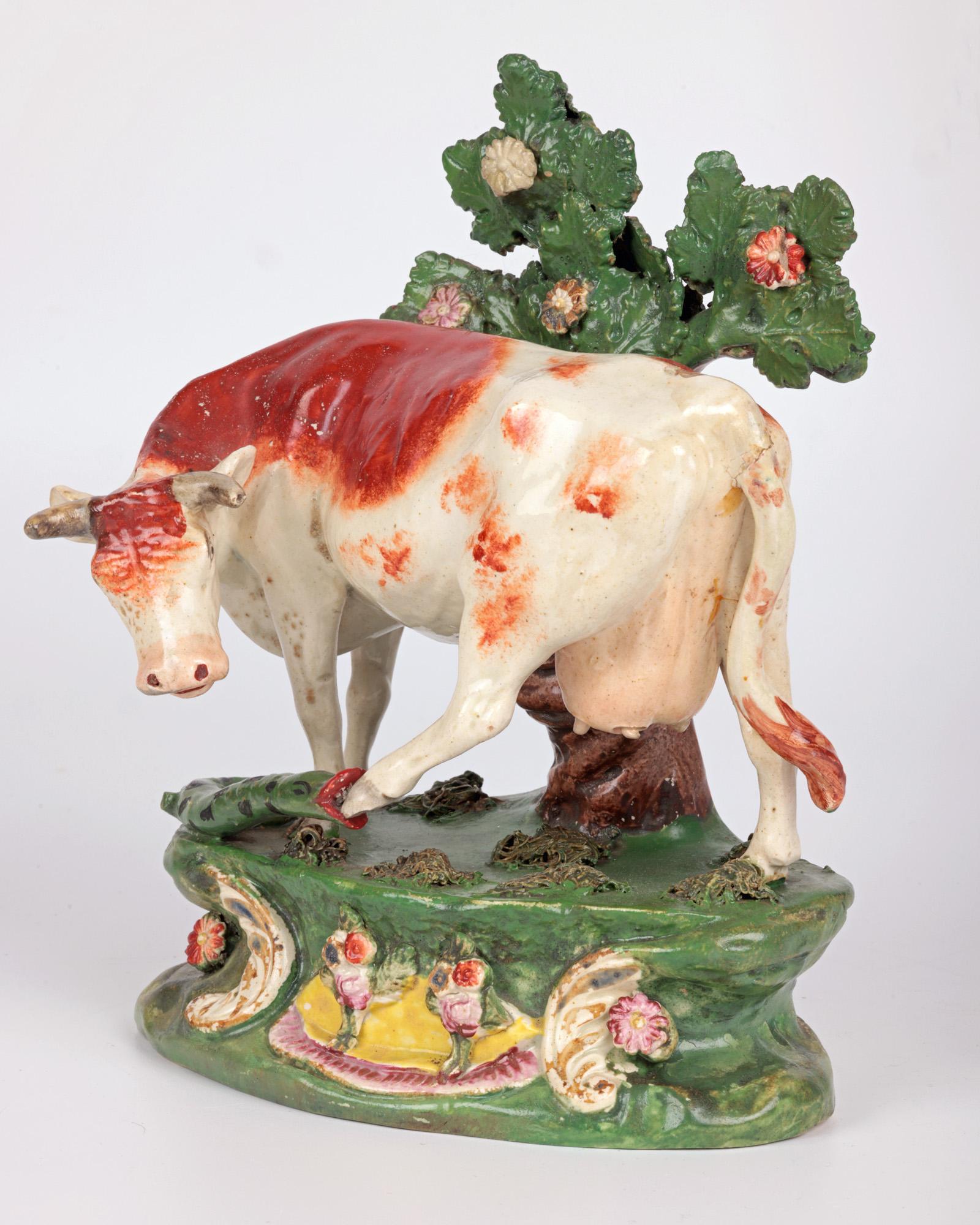 19th Century Staffordshire Pottery Cow Attacked by a Snake Pottery Figure
